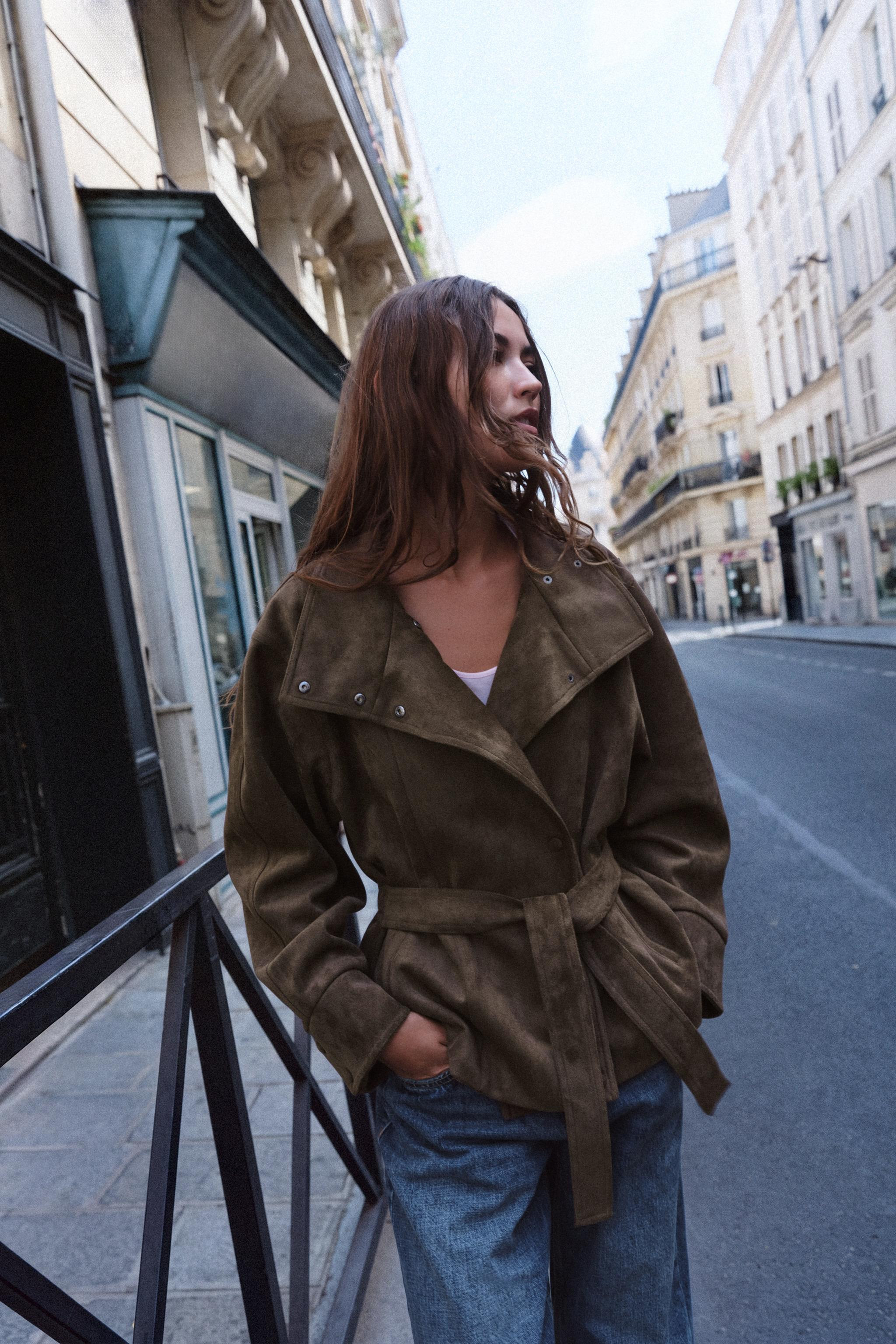 Jacket with a high collar and long sleeves. Front pockets. Featuring a matching fabric belt and g... | Zara FR