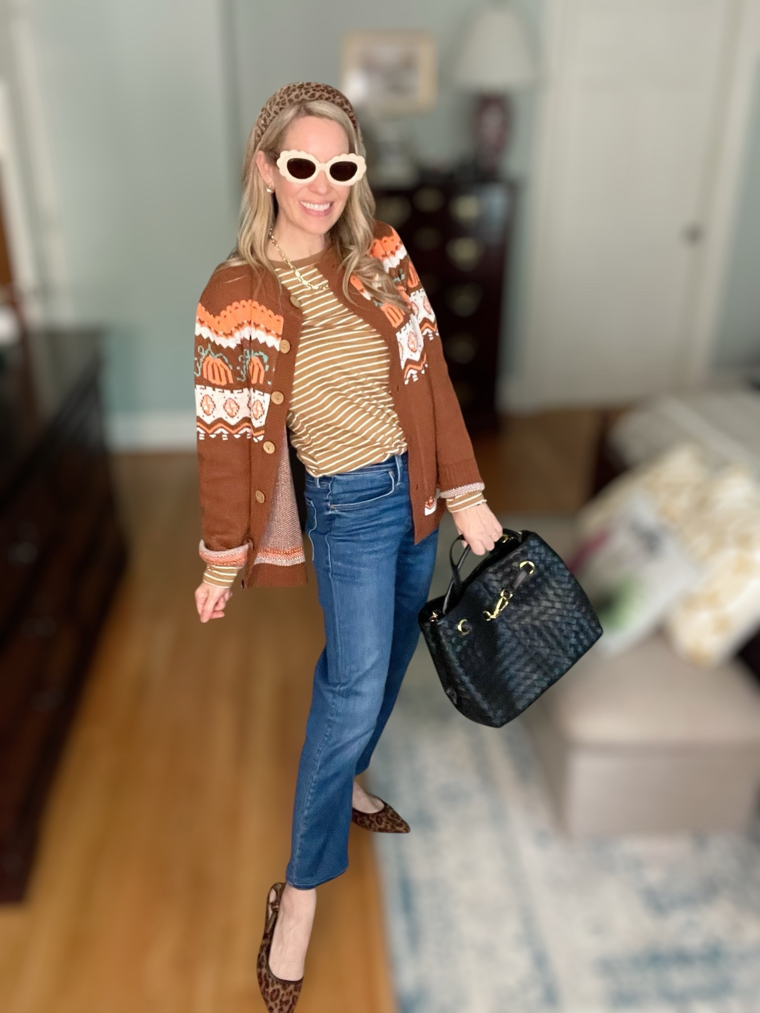 🍁 Fall fashion is in full swing and I’m loving this cozy-chic look that’s perfect for pumpkin spice season! I layered a Fall Halloween cardigan sweater 🎃 over a striped long sleeve top for effortless autumn style. Paired with classic Mother Denim jeans 👖 and chic leopard print slingback flats 🐆, this look is equal parts comfy and polished.

To accessorize, I added a leopard print headband and fun retro-inspired sunglasses 🕶️ for a playful vibe, plus my go-to black satchel bag 👜. For jewelry, I styled it with Melinda Maria gold layers ✨—the Lil Frankie chain necklace, bracelet stack, and chic gold hoops—all timeless staples that elevate everyday outfits.

This outfit is perfect for everything from fall festivals to casual coffee dates, and each piece mixes & matches so easily for endless autumn looks! 🍂☕

✨ Shop my fall outfit details below & use my code PREPPYREBEL for 10% off Melinda Maria jewelry.

⸻

fall outfit inspo, cozy fall cardigan, striped top outfit, classic denim look, leopard flats, fall accessories, Melinda Maria jewelry, chic fall style, Amazon fashion, Walmart fall finds, Abbott Lyon watch


#LTKFindsUnder100 #LTKShoeCrush #LTKFindsUnder50