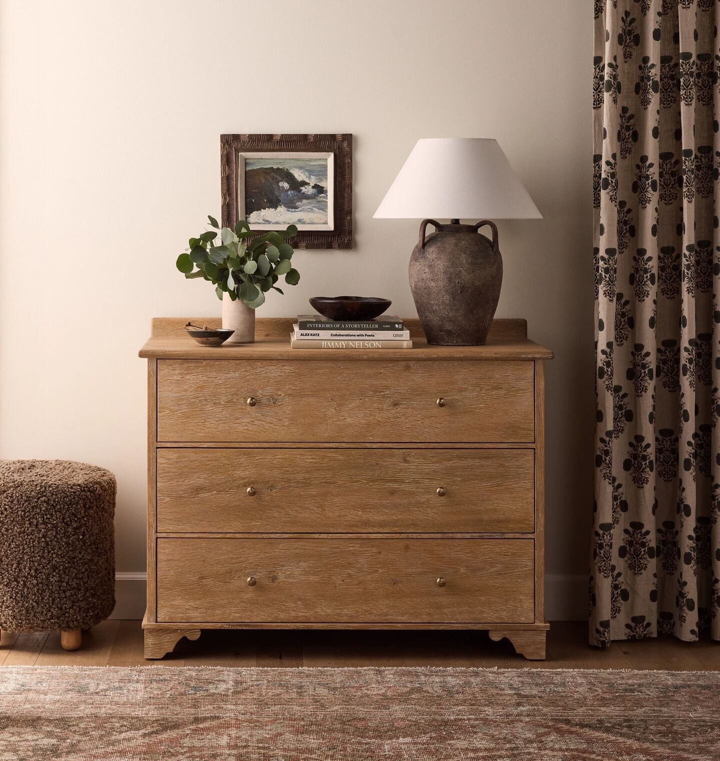 Inspired by traditional European design, the Meli Dresser is defined by simple lines and thoughtful carved detailing. Finished with a classic bracket foot base, its gently antiqued finish adds both warmth and subtle character while three generous drawers offer ample storage space. Crafted with both form and function in mind, this chest would be a timeless addition to any home.

#LTKHome