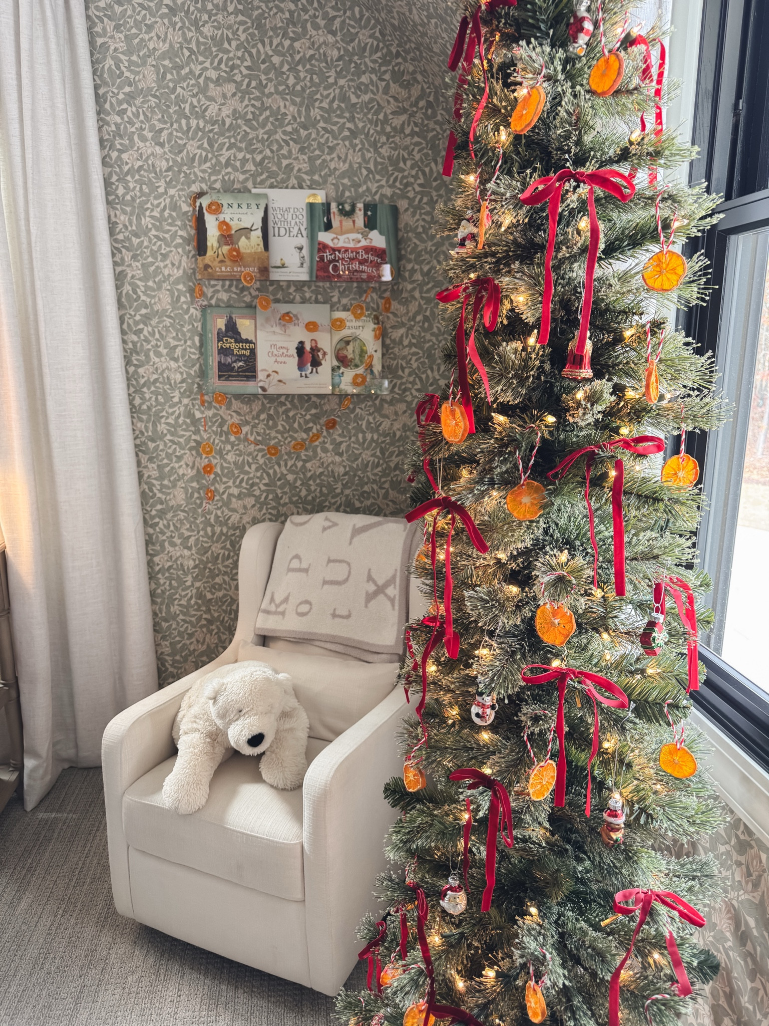 Slim Christmas tree with oranges and bows, little girls nursery. 

#LTKHoliday #LTKHome