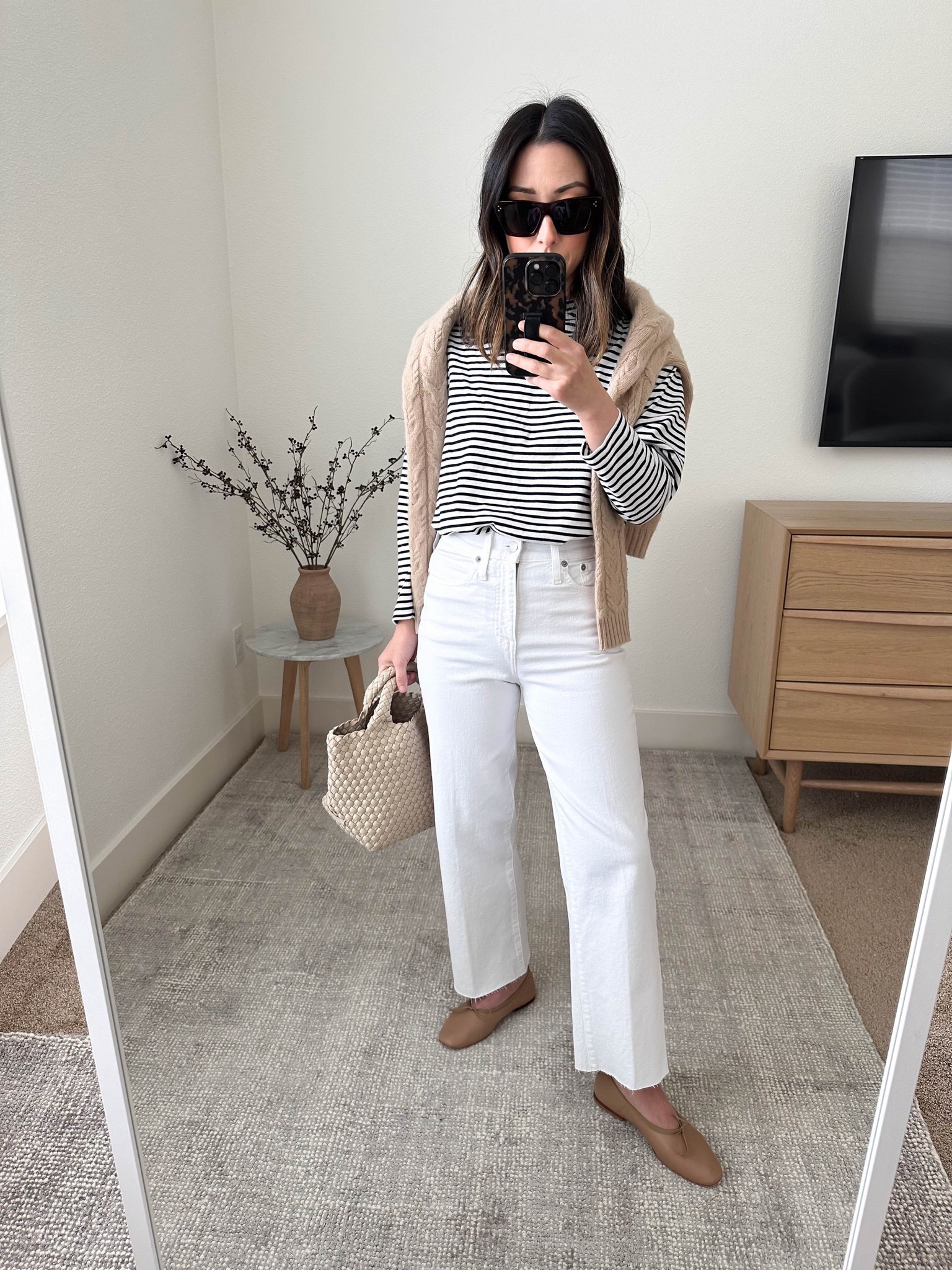 J.Crew slim wide leg jeans in white. Wearing size 24 petite. These are so incredibly comfortable! 

AYR frenchy dry tee xs
Filoro Cashmere sweater small (old)
J.Crew slim Wide leg jeans petite 24
Mansur Gavriel ballet flats 35
Naghedi mini in ecru 
Celine Sunglasses. 

White denim, spring outfits. Petite outfits, jeans. 


#LTKitbag #LTKSeasonal #LTKshoecrush