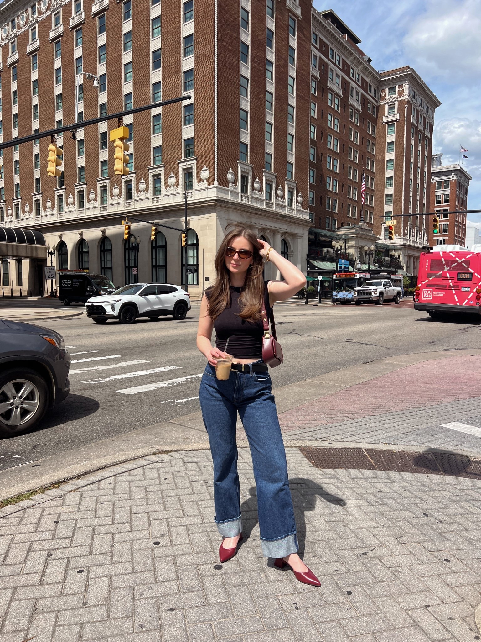 Mock neck black top, denim jeans, red bag

#LTKFindsUnder100