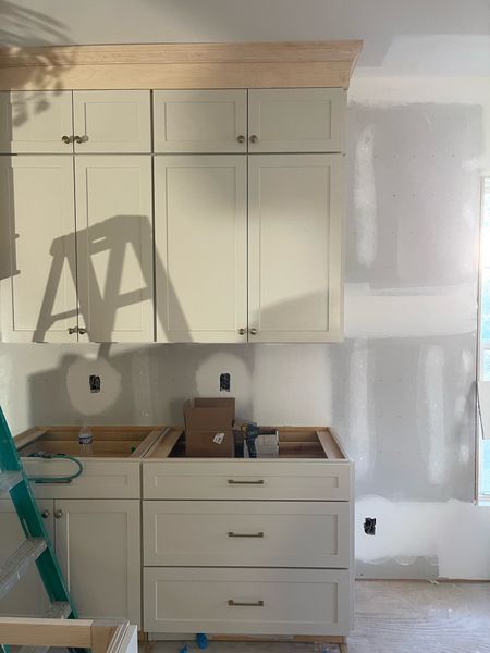 Kitchen progress! Linking cabinet hardware - we did color Satin Bronze on wall cabinets and the matte black on the island 

#LTKhome