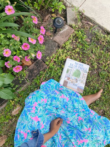 Sitting in the garden with my latest design coffee table book. In my favorite floral dress  

#LTKstyletip #LTKhome #LTKunder100