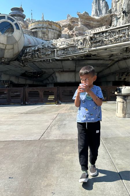 Auggie loves his blue milk from Disneyland! He’s wearing a size 4 track pants, 5-6 t-shirt, 11 shoes

#LTKtravel #LTKkids #LTKbaby