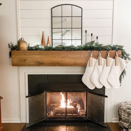 Decorating our fireplace mantel for Christmas is fun.  I try to keep it simple and minimal.  

Christmas decorations.  Stockings.  Christmas garland.  Gold bells.  Christmas stocking holders.  

#LTKHoliday #LTKhome #LTKSeasonal