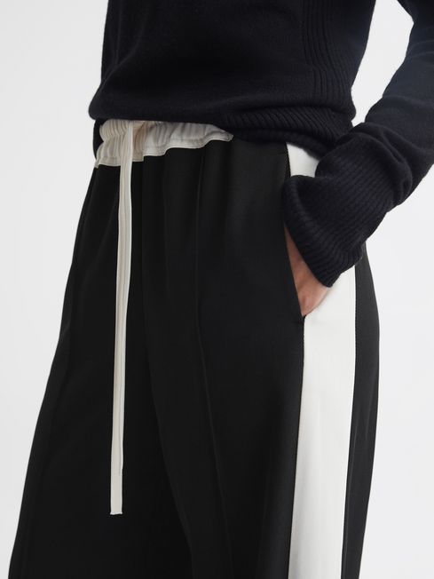 Reiss Black May Wide Wide Leg Contrast Stripe Drawstring Trousers | Reiss UK