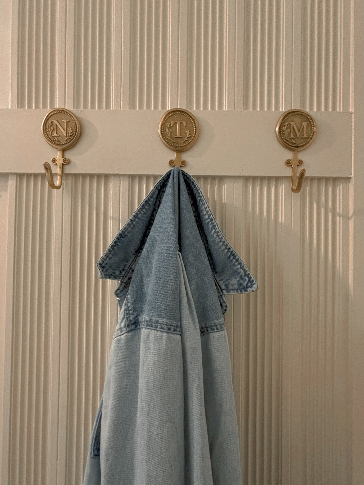 Not only are these hooks from Anthropologie beautiful but they are sturdy and well made! I installed these hooks 2 years ago and they get used everyday. They still look brand new and have handled the weight of our coats/jackets through every season (we live in Michigan so we hang some pretty heavy coats)! I ordered one for everyone in my family so no more fighting over hooks-everyone gets one with their initial! This has been so great with keeping our little space pretty and organized! 

#LTKHome