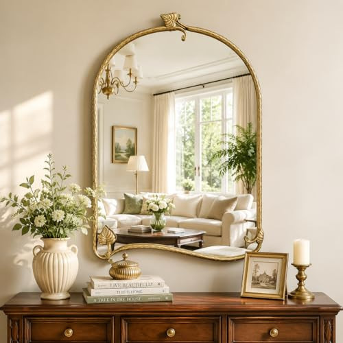 Uniclinens Modern Arched Wall Mirror - Large Retro Gold Beveled Mirror for Wall Decor with Leaves Metal Frame, Glam Ornate for Entryway, Fireplace, Living Room, Hallway, Bathroom,36"X24" | Amazon (US)