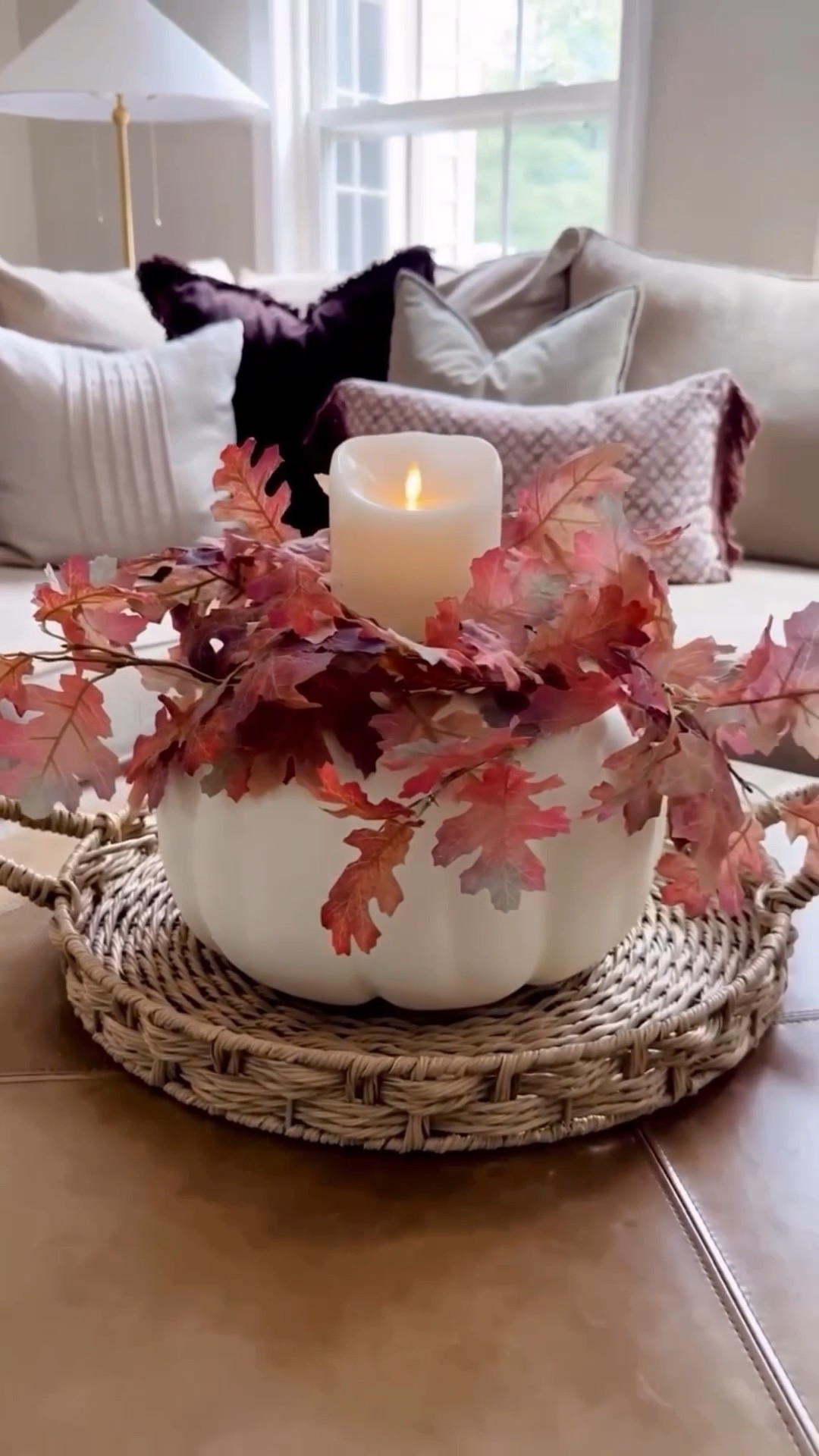 DIY Pumpkin & Leaf Luminary🧡 Create a cozy and charming addition to your decor this autumn! 🍂All you need is a craft pumpkin, some leaf picks, and a flameless candle. 

Trace a circle on top of your pumpkin as a guide. Carefully cut out the top and remove. Now you are ready to set a candle inside. 

I used some florist wire to tie and form a secure candle
wreath using one long leaf stem. Set on top of your candle and enjoy the warm and magical glow of your pumpkin luminary all season long. 

#LTKSeasonal #LTKHome #LTKStyleTip