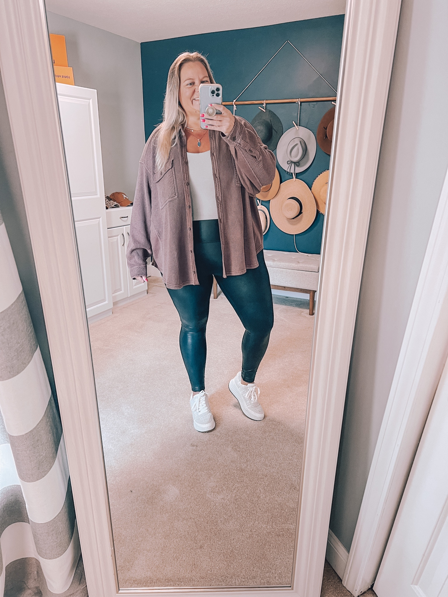 I’m convinced there is nothing that doesn’t go with faux leather leggings. Whether dressed up or down, they always look good. Here I styled casually with a tank top, brown shacket, and platform sneakers. This outfit would also be cute with Ugg ultra mini boots once the temps drops. 

Casual look | casual outfit | plus size | plus size outfit | leggings outfit | platform shoes | shacket | waffle knit | button up | Spanx 

#LTKplussize #LTKover40 #LTKSeasonal