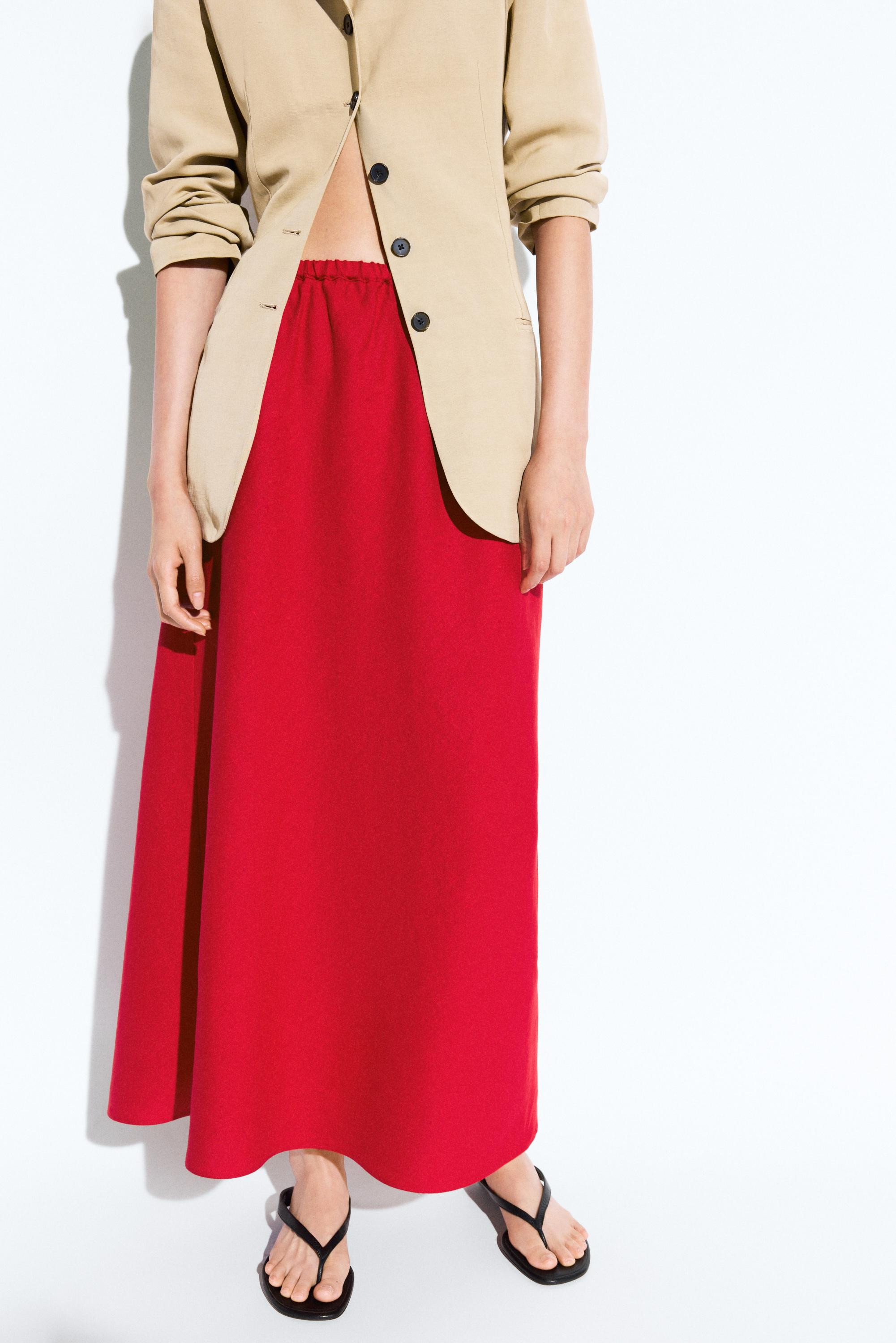 Midi skirt crafted from 100% linen fabric. Featuring an elasticated waistband and an A-line desig... | Massimo Dutti US