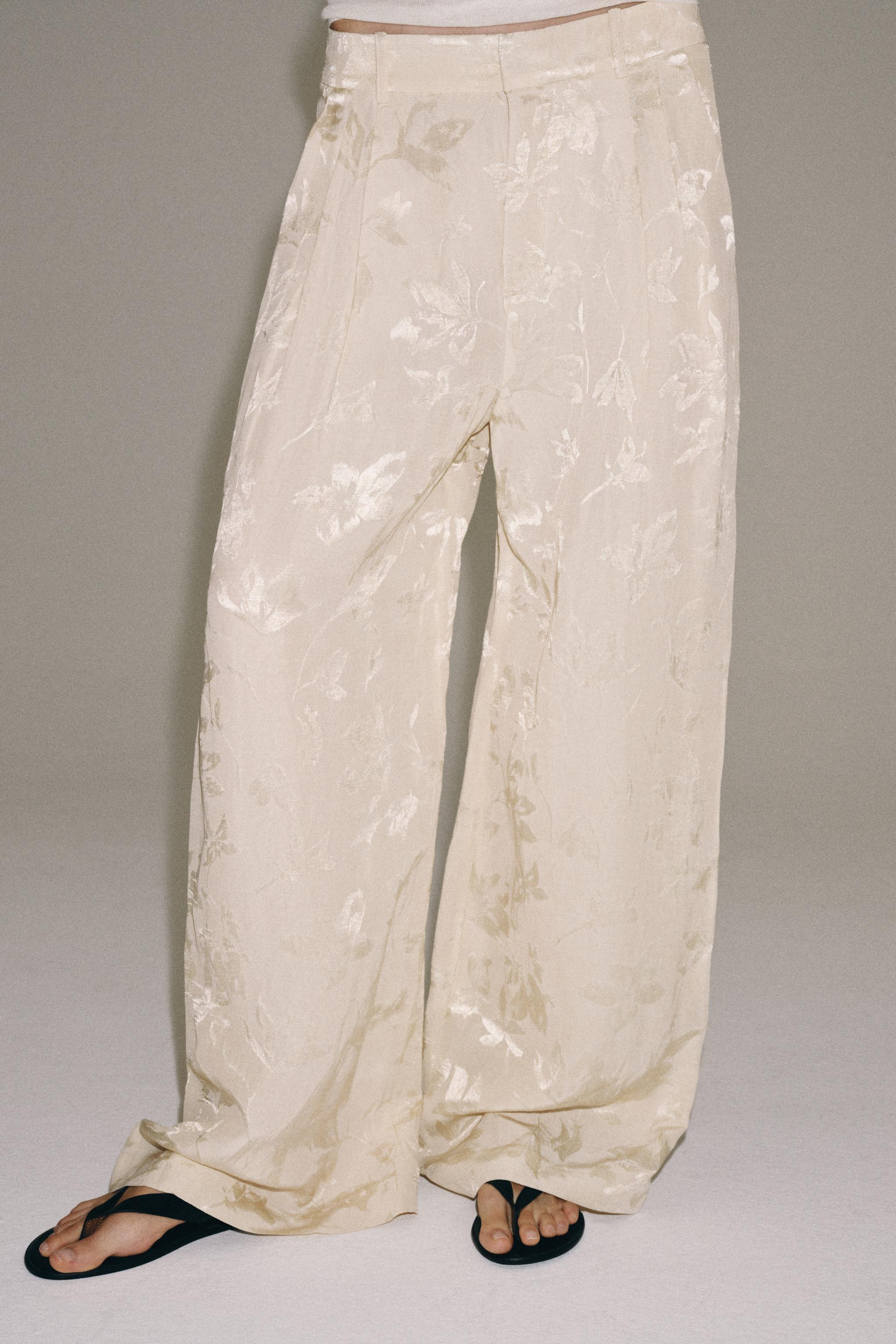 ZARA WOMAN COLLECTIONPants made of 32% linen yarn. Mid-rise waist with belt loops. Side pockets h... | Zara US