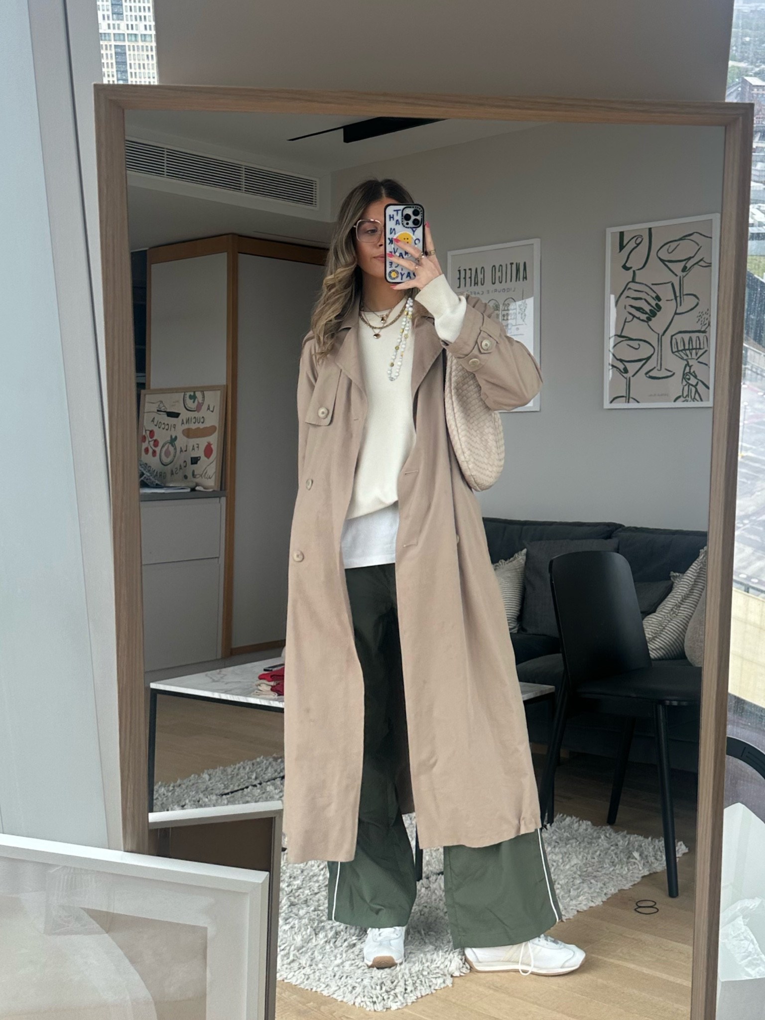 ootd, spring summer outfit inspo, rainy day outfit inspo, green track pant, sportswear adanola, activewear, tracksuit, trouser, white tshirt Uniqlo, basic tee, cream knit sweater, trench coat, woven bag Anthropologie, M&S, white adidas country OG trainer 

#LTKstyletip #LTKSeasonal #LTKshoecrush