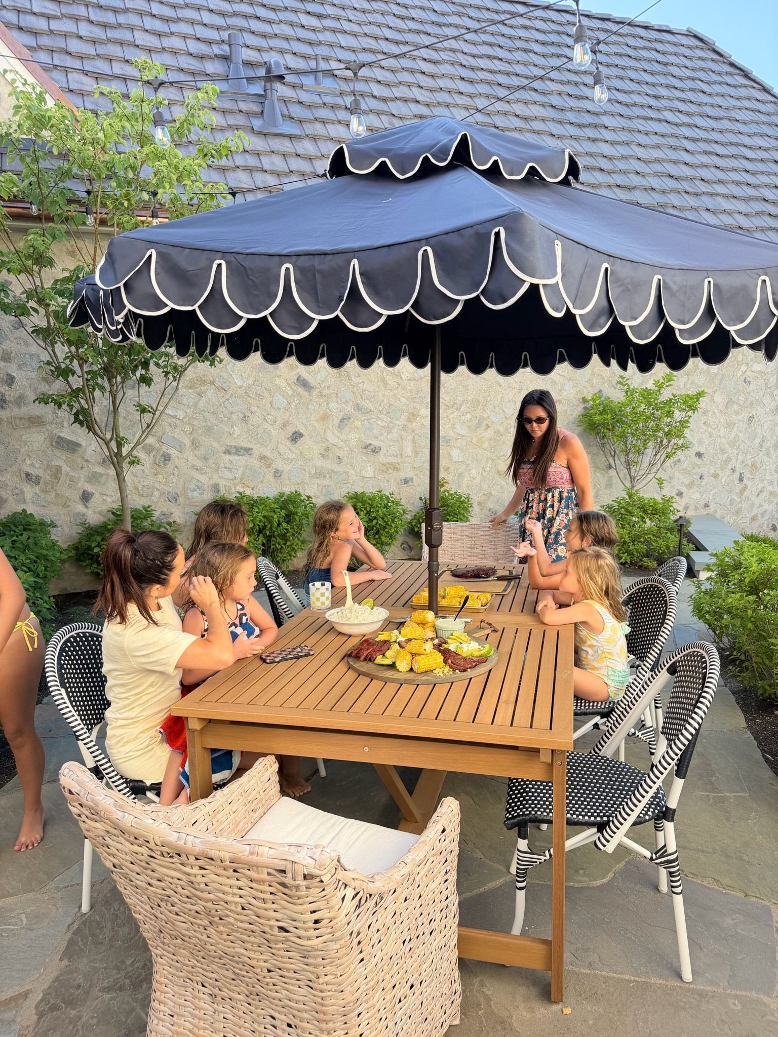 Outdoor patio dining table extends from 8-10! Scallop umbrella, stackable bistro chairs, and weather proof woven captain chairs. @Wayfair #ad #wayfair #outdoor #wishyouwerehere #wayfairpartner

#LTKSaleAlert #LTKHome