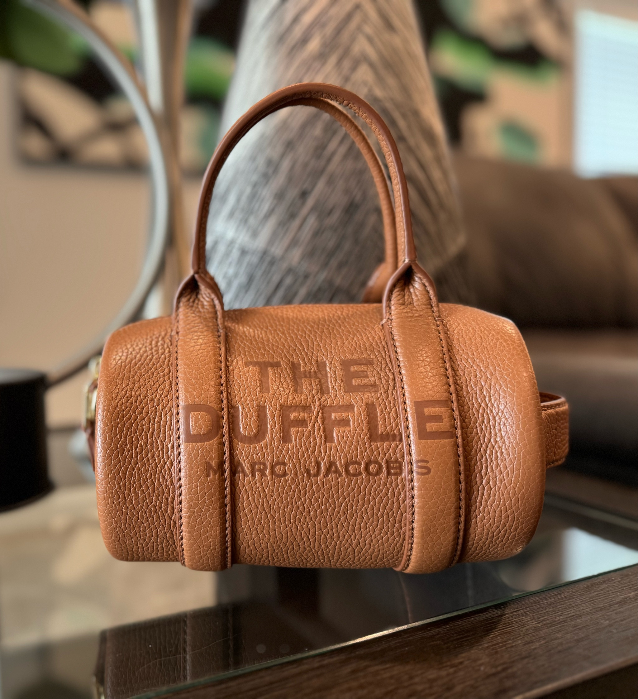 The Mini Duffle by Marc Jacobs! Its compact size is deceivingly spacious, it really packs a punch! #MarcJacobs #TheMiniDuffle 

#LTKStyleTip #LTKItBag