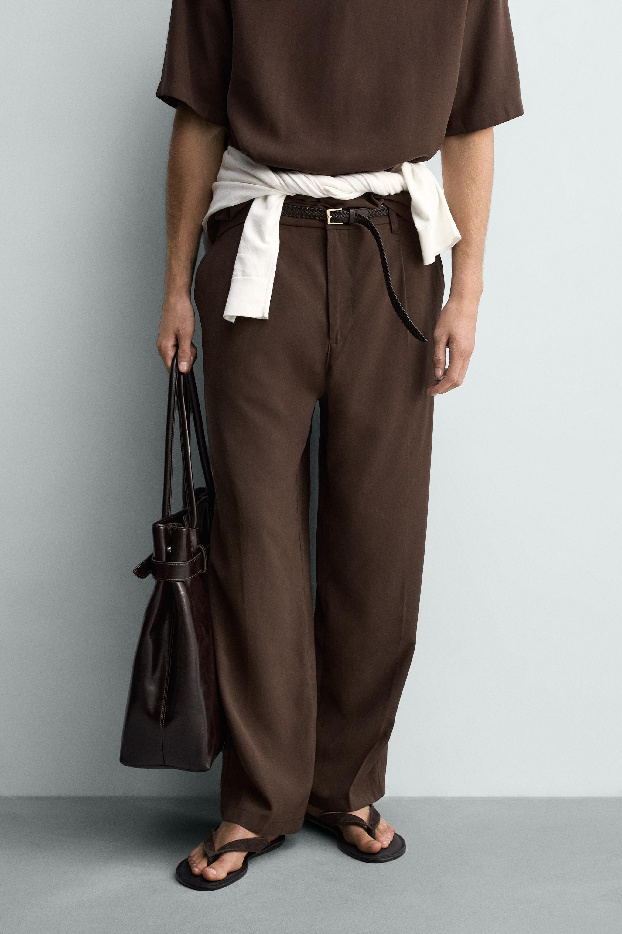 DescriptionColorContentsMeasurementsRelaxed fit pants made of flowy viscose blend fabric. Elastic... | Zara US