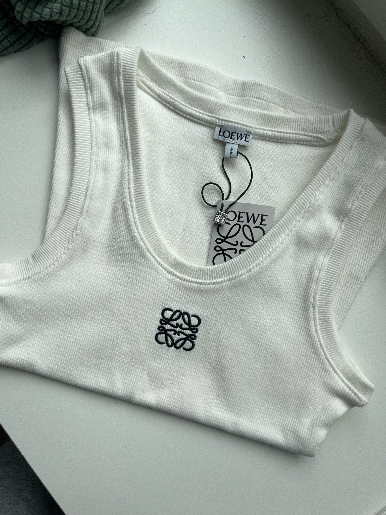 Loewe DH $28 tank 

#LTKFind #LTKSeasonal #LTKsalealert