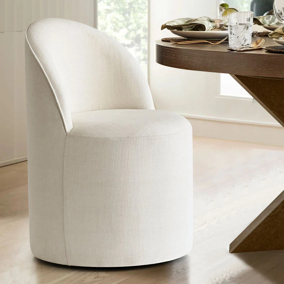 Linen Upholstered Swivel Dining Chair with Castors | Wayfair North America