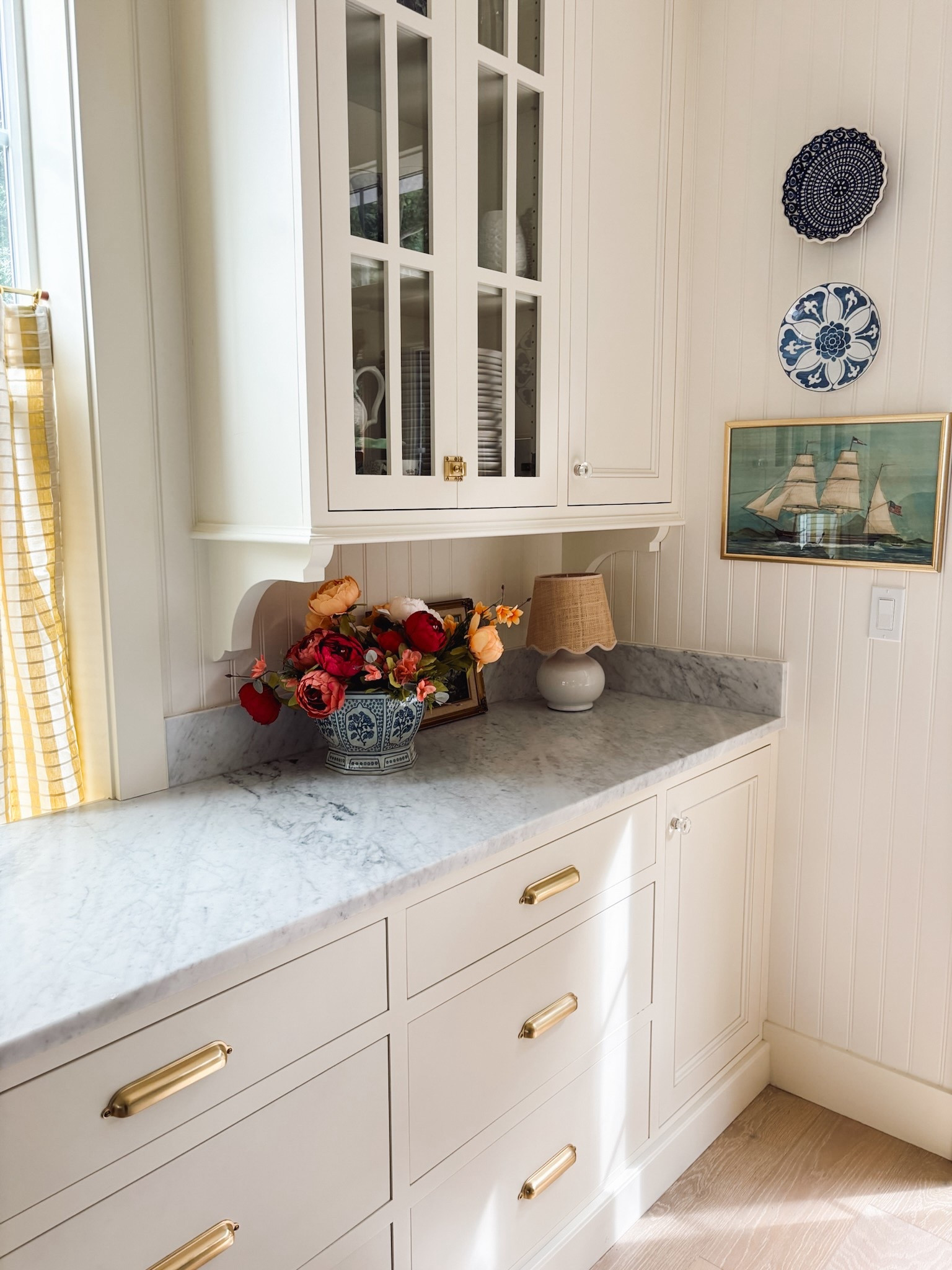 Kitchen corner lamp, blue and white pot, faux peonies, plates, plate hanger, cafe curtain 

#LTKHome #LTKStyleTip #LTKSeasonal