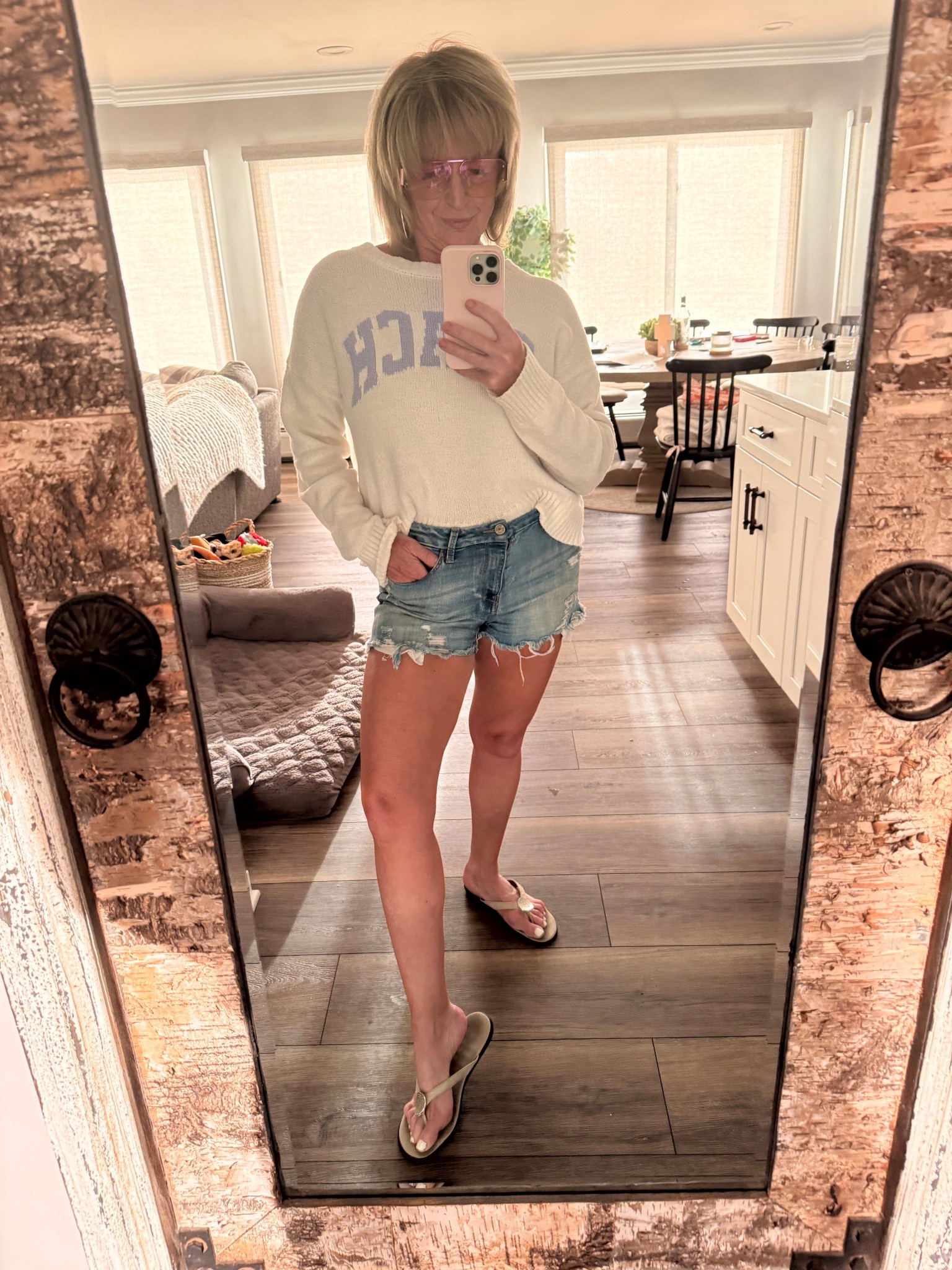 Weekend uniform unlocked ✔️ Comfy knit sweater, distressed denim shorts, and flip flops for that effortless, casual vibe. Perfect for coffee runs, beach days, or just lounging in style.

#LTKSeasonal #LTKOver40