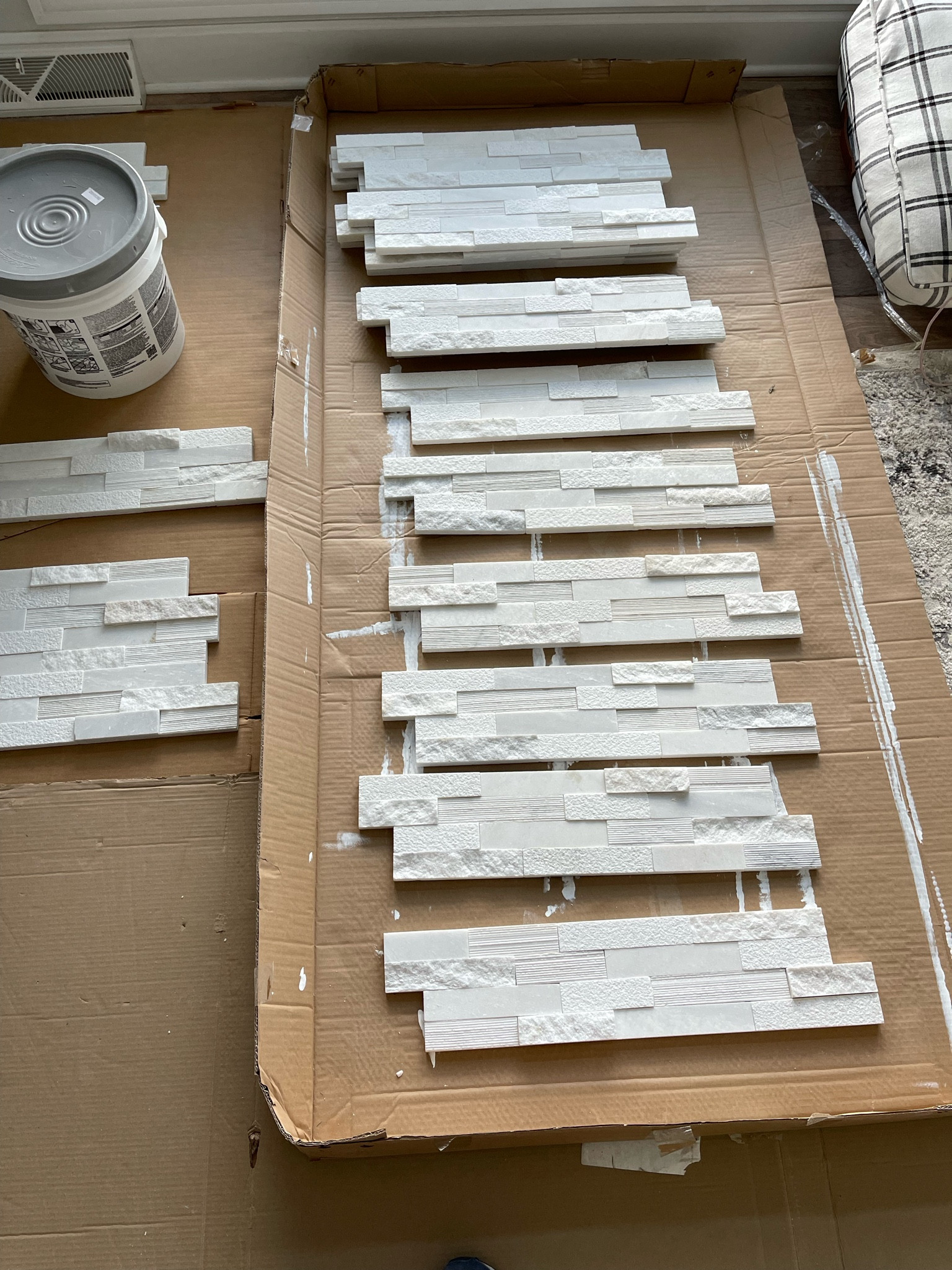 Stacked marble tile 
Living room decor, fireplace tile, DIY fireplace front 
Wayfair find, gray and white tile 

#LTKFind #LTKhome #LTKstyletip