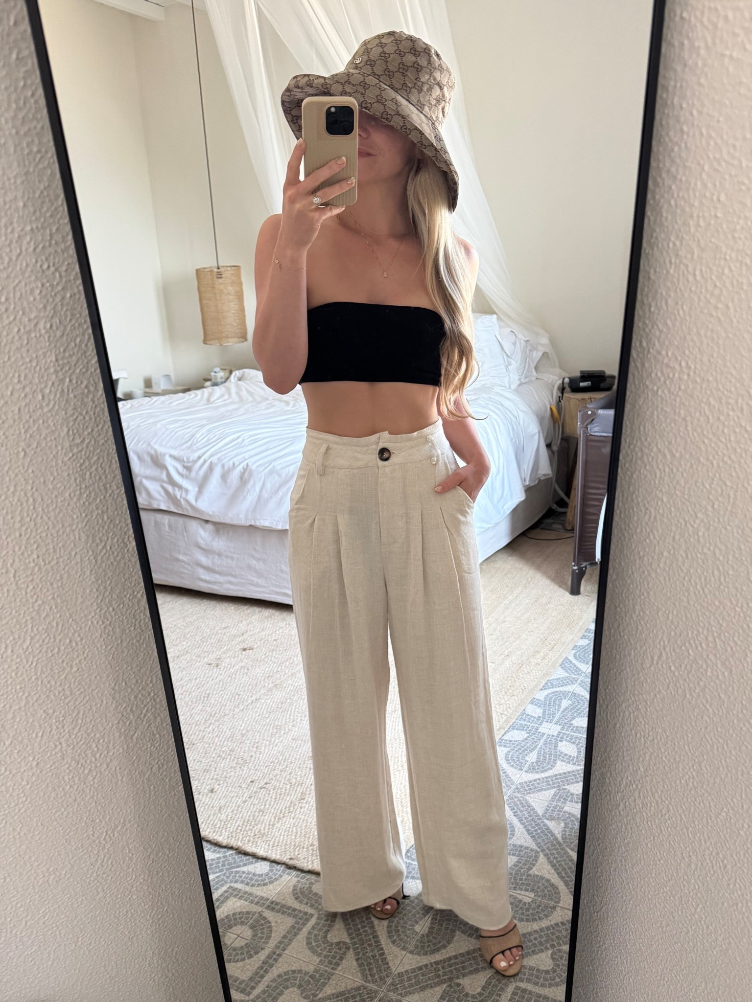 The perfect beige wide leg linen pants for petite girls! Styled with the most trendy hat for summer 2025 - the Gucci bucket hat aka the Gucci White Lotus hat. Paired with a black crop top for a chic elegant minimalist look for European summer 2025. You can also get this look with the Jacquemus bucket hat!

#petitestyle #guccihat #guccibuckethat #summer2025 #europeansummer #eurosummer #summerlook #mykonoslook #ibizalook #beachclublook #vacationlook #vacation2025 #summeraccessory #summerhat #linenpants #petitelook #quietluxury #loudluxury #minimaliststyle #capsulewardrobe #capsuleessentials #oldmoney #stealthwealth #whitelotushat 

#LTKsummer #LTKeurope #LTKtravel