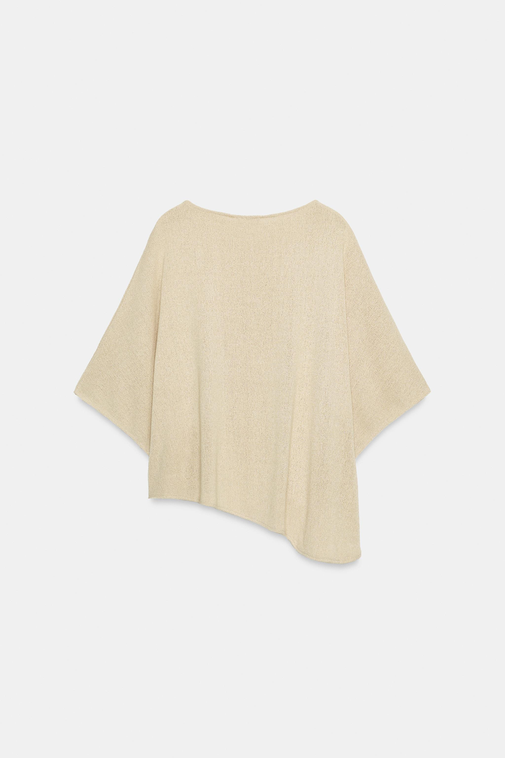 Top aus Strukturstoff. U-Boot-Ausschnitt und weite kurze \u00c4rmel. Asymmetrischer Saum. | Zara DE