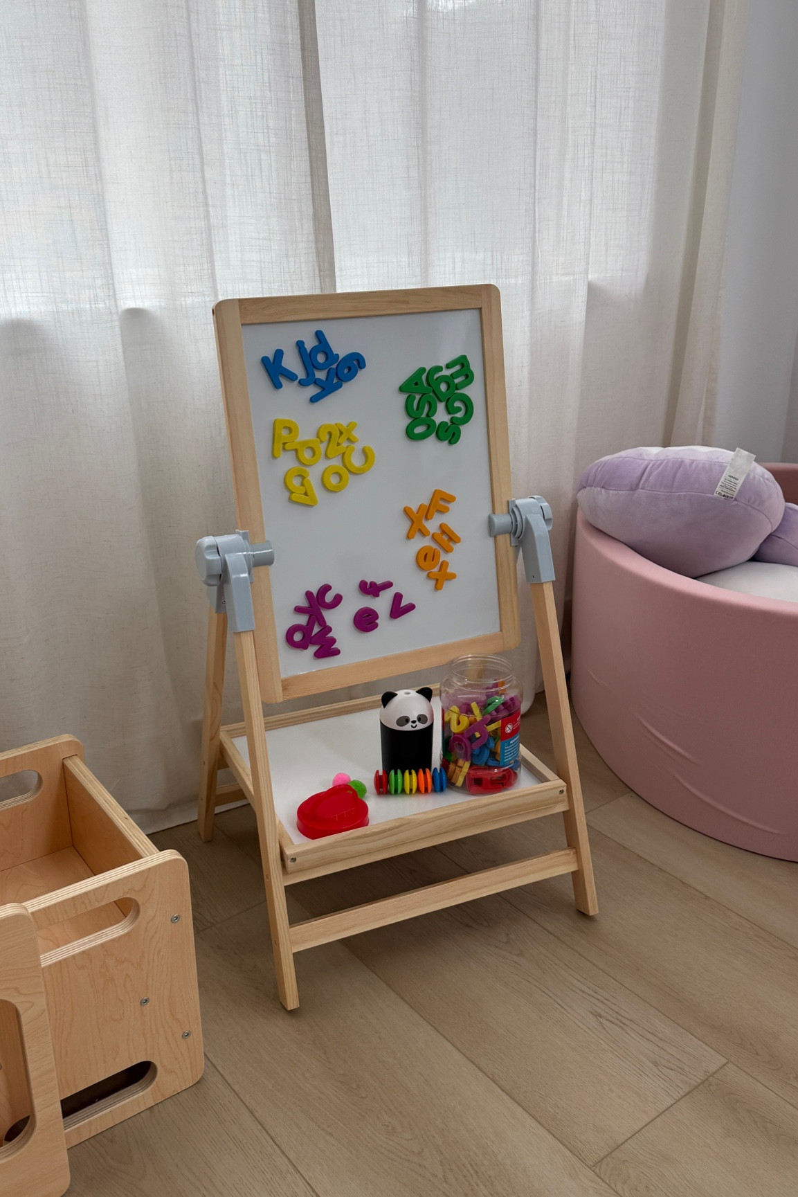 my toddlers play corner with her new easel! #toddlertoys #toddlermom #2yearoldtoys 

#LTKBaby #LTKGiftGuide #LTKKids