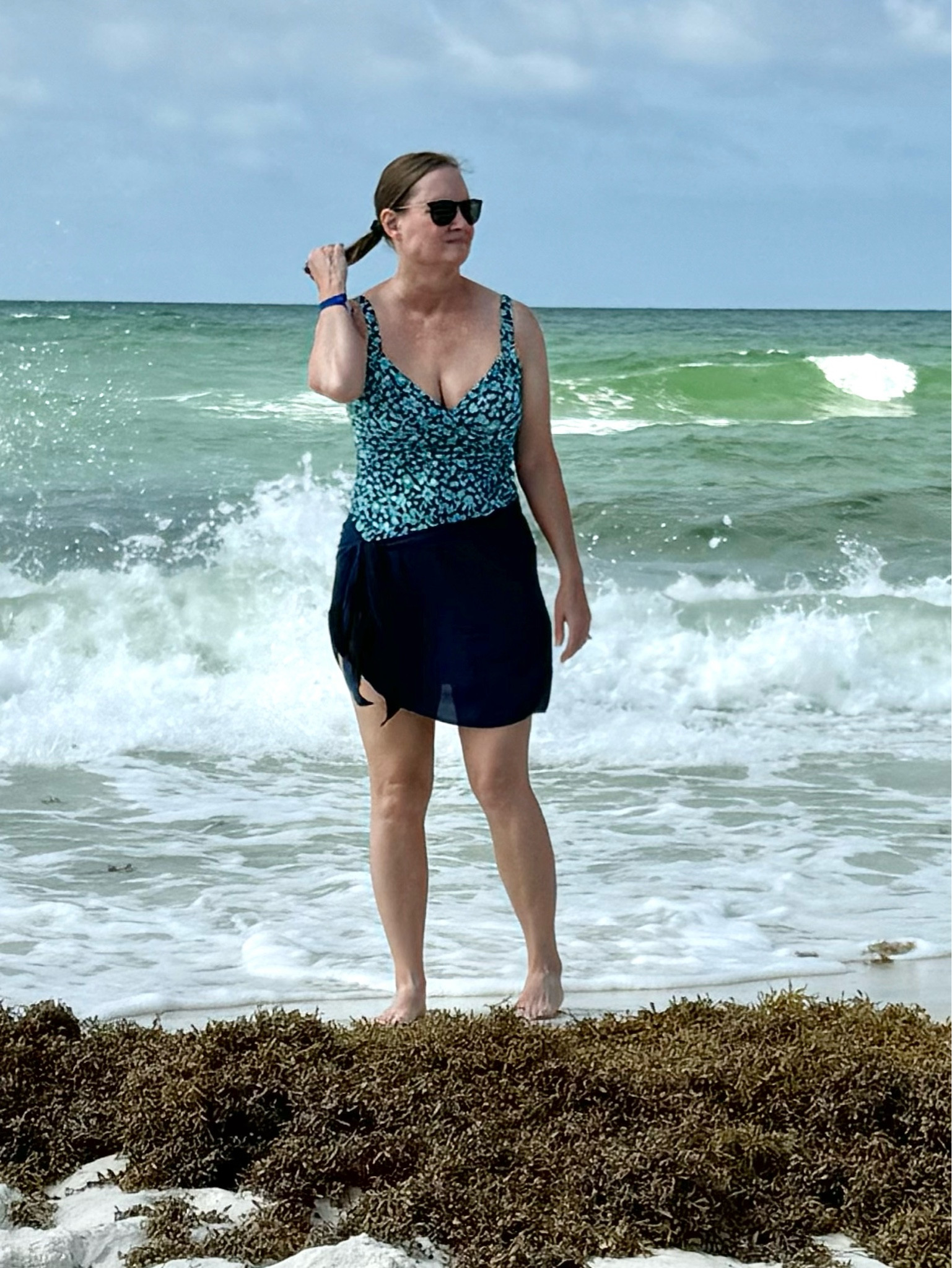 What I wore at the beach on our Florida vacation 🏖️ @LandsEnd Tankini, High Waist Bikini Bottom and Sarong Wrap

#LTKSeasonal #LTKMidsize