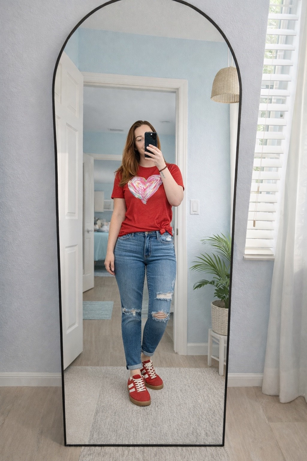 Valentine’s Day ready! 💌 This heart graphic tee is so soft and pairs perfectly with distressed denim. These red sneakers are a total mood booster. 
#valentinesdayoutfit #graphictee #casualstyle #redsneakers 

#LTKFindsUnder50 #LTKootd #LTKFindsUnder100