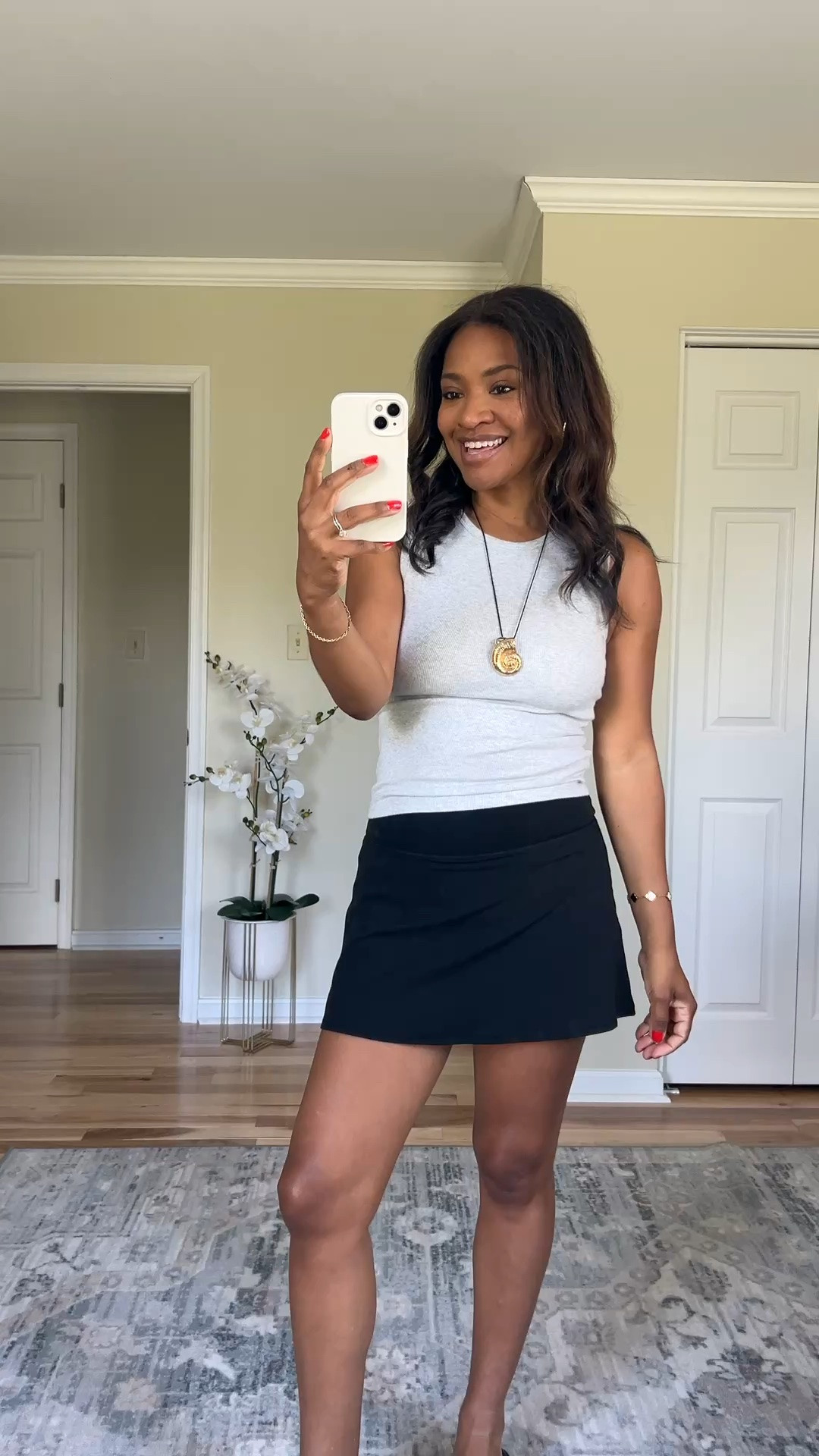 Wearing a small in top and skirt! Loveee this skirt! Has built in biker shorts. Comes in other colors. My top is a bra free tank.

#LTKgrwm #LTKOver40 #LTKootd