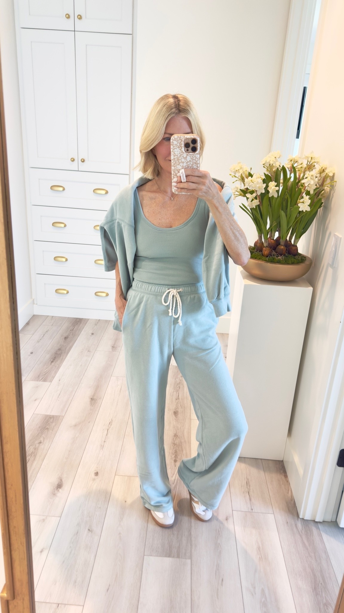Love this set 🤍
I’m wearing an extra small in the pants, a small in the shorts & sweatshirt and a medium in the tank top. ￼

#LTKootd #LTKActive