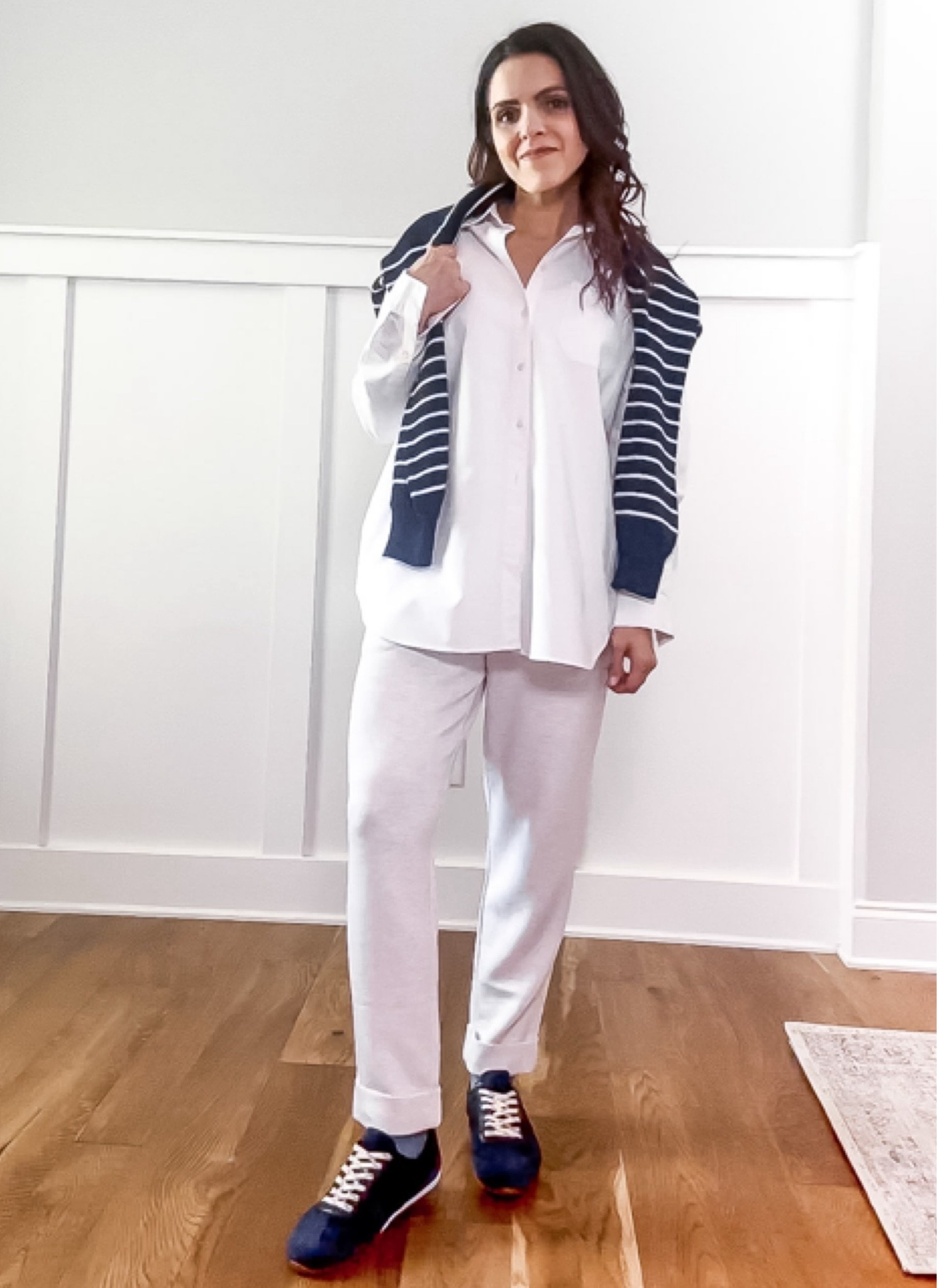 Outfit formula: sandwich method | Repeat a color at the top and bottom of the outfit to make everything feel more connected. 

White button-down, navy striped sweater, cream sweats, navy sneakers.

#LTKootd #LTKgrwm