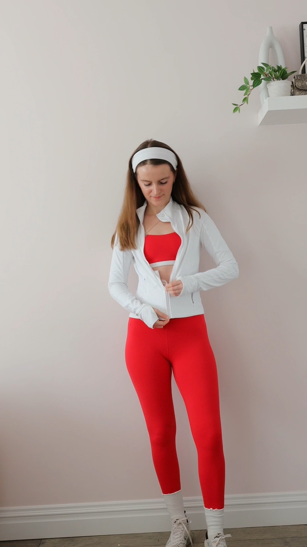 Getting ready for my P.volve workout class! A matching workout set hates to see me coming 🤣❤️. This leggings and sports bra set, paired with grippy socks, sneakers, a zip up workout jacket, and a workout headband, is perfect for Pilates, yoga, or hitting the gym.
.
.
.
.
.

Workout outfits | Workout tops | red workout set | workout leggings | workout sets | Pilates outfits | Pilates set | Pilates socks | athletic outfits | athleisure outfits | athletic sets | gym outfit | gym set | leggings outfit | leggings and socks  | red leggings | casual leggings outfit | gym leggings | red top | tops for leggings |  yoga outfits | yoga set | 
#LTKSpringSale #LTKFitness

#LTKWatchNow #LTKSeasonal #LTKActive #LTKU #LTKSaleAlert #LTKPetite #LTKFindsUnder50 #LTKFindsUnder100 #LTKStyleTip #LTKShoeCrush