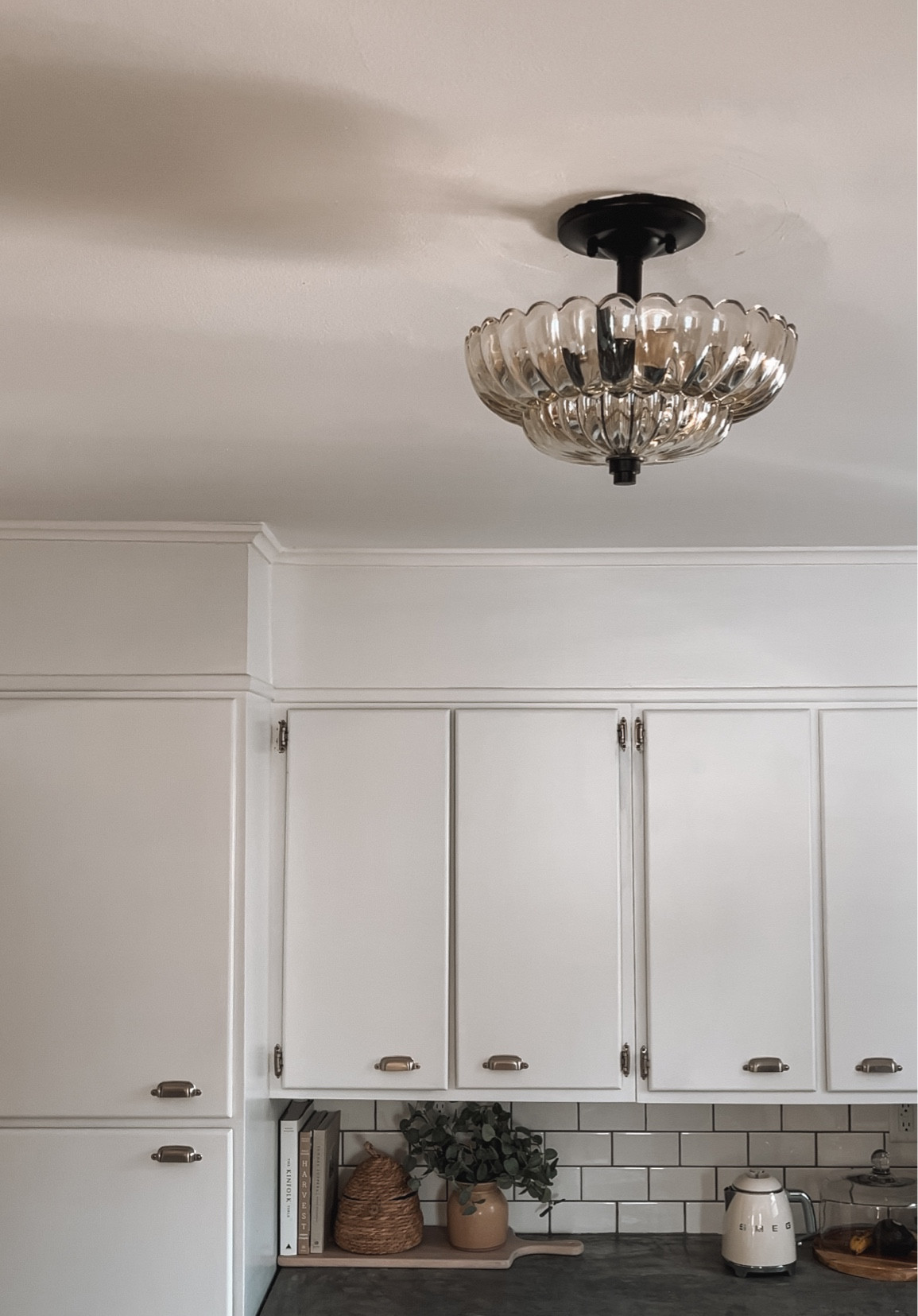 New kitchen flush mount - it’s 11.75 inches wide sold at many places. I have the Amber glass version!

#LTKMostLoved #LTKhome