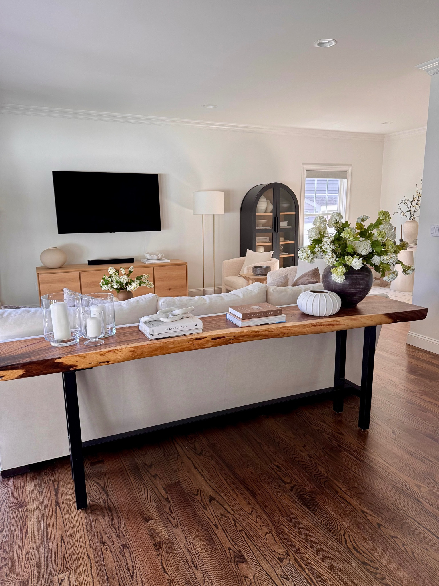 This is one of those spaces people overlook—but it changes everything.
A styled console behind the sofa makes the room feel finished, not floating.


console table styling, behind sofa decor, living room layout ideas, modern organic decor, wood console table, neutral living room, home styling ideas, candle styling, coffee table books decor, layered home decor, open living room layout


#consoletable
#livingroomdecor
#homestyling
#neutraldecor
#interiorstyle


#LTKSeasonal #LTKgrwm #LTKHome