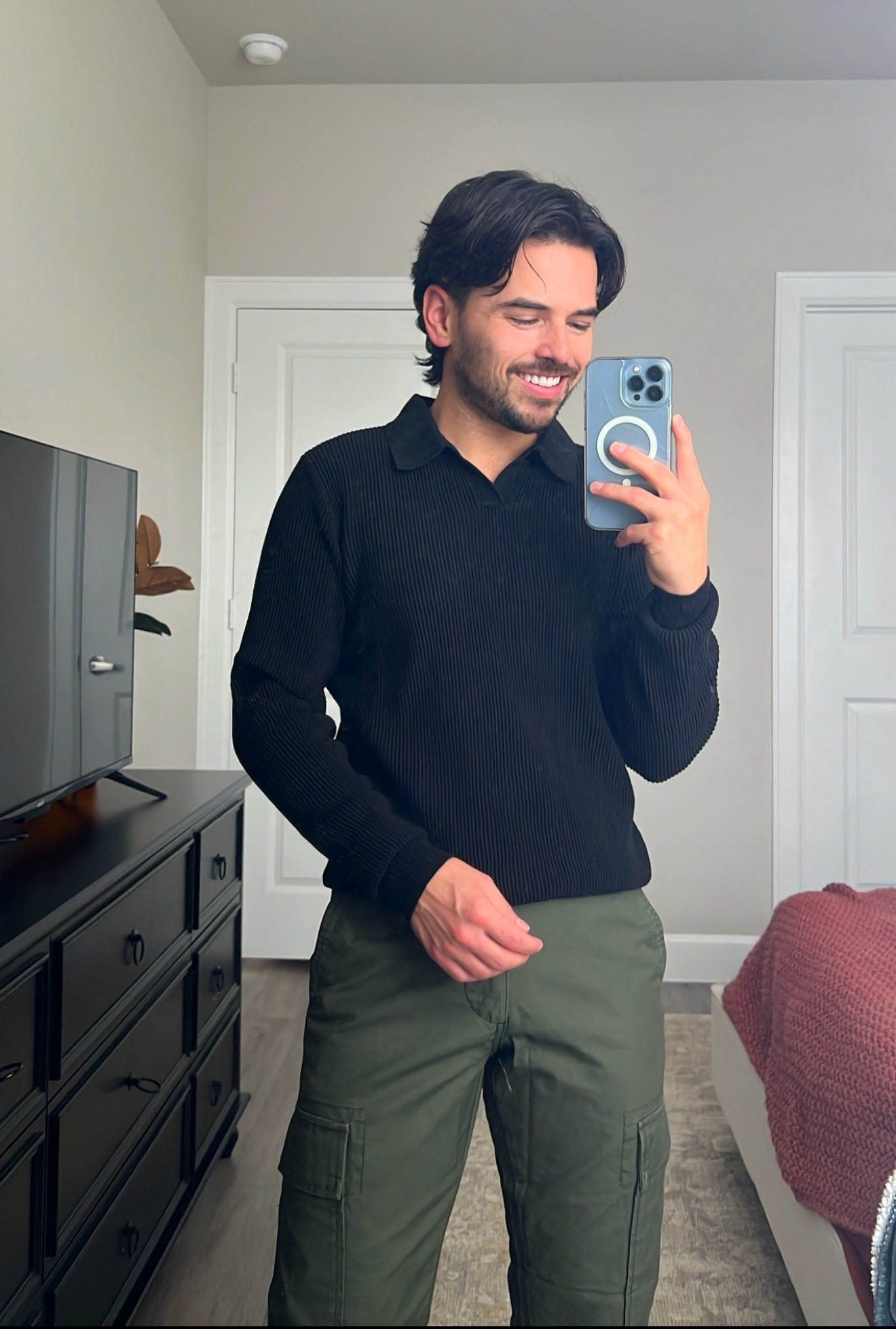 The long sleeve sweater knit polo is currently 30% off | Fall outfit | men’s fall outfit idea | fall pants | olive green pants | cargo pants | men’s black long sleeve | sweater polo 

#LTKSeasonal #LTKWorkwear #LTKMens