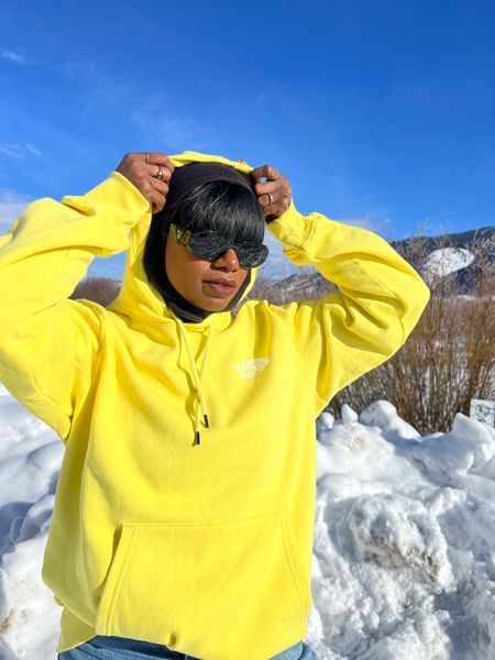 Yellow North Face Hoodie and balaclava for outdoor winter activities  

#LTKunder50 #LTKtravel #LTKunder100