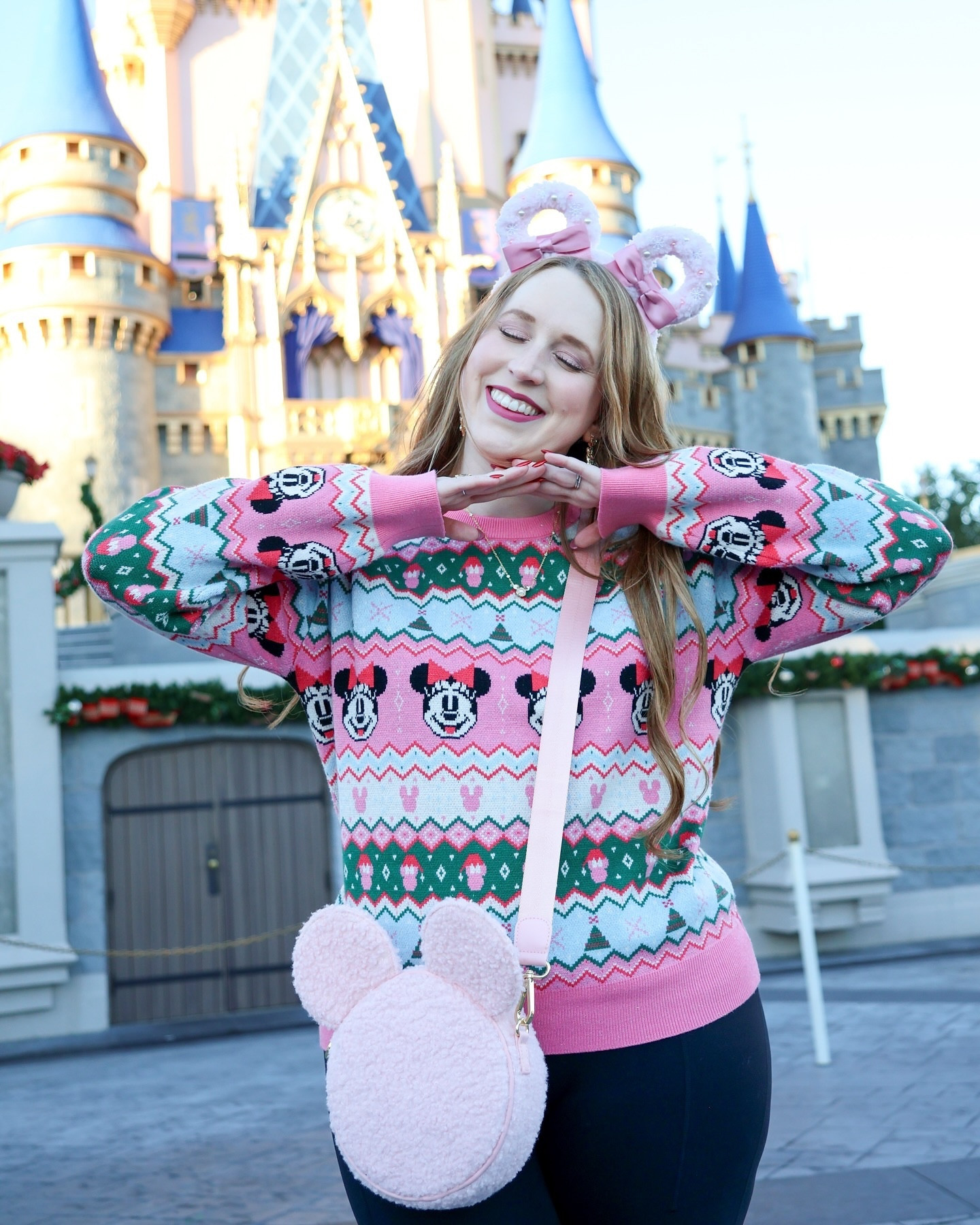 i’m dreaming of a🩷pink🩷christmas 

we had the BEST time at mickey’s very merry christmas party! our first stop was visiting the updated country bear’s attraction so ryan could show his parents his favorite bears. just look at the pure joy in his eyes 🥹

thank goodness it was ~sweater weather~ because it meant we could pull out these matching beauties! honestly it was so cold i was wearing 3 sweaters at one point. the unlimited cookies and hot cocoa (and lactaid pills) kept me fueled all night 🍪

the highlight of the evening was mickey’s once upon a christmastime parade! the snoap on main street is just so magical. ryan took the most stunning pictures of the parade - i can’t wait to share them! i’m starting to run out of days to post christmas content though, so i need to get it together 😅

swipe to the end for the best tea cup spinning you’ll ever see ☕️

sweaters: @disneystore 
ears: @thegoodears 
purse: @stoneyclover 
necklaces: @kendrascott 
pants: @popflex_active 
shoes: @puma 

#disneyparks #christmasatdisney #magickingdom #mvmcp #pinkmas 
 @disneyparks @waltdisneyworld

#LTKMidsize #LTKHoliday #LTKTall