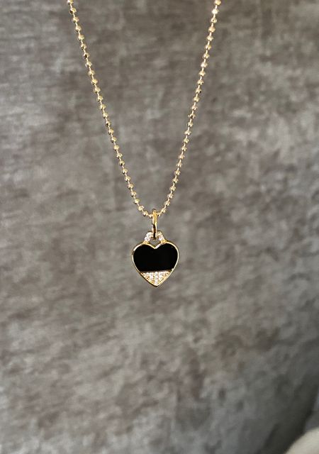 Valentine’s Day. Gift idea. Gifts for her. Heart pendant. Heart charm. Heart necklace. I love the edgy vibe to this heart charm. Wear casually or dressy and layer with other chains or necklaces. Also comes in silver and longer length options  Code HINTOFGLAM to save. 

#LTKGiftGuide #LTKfindsunder100 #LTKover40