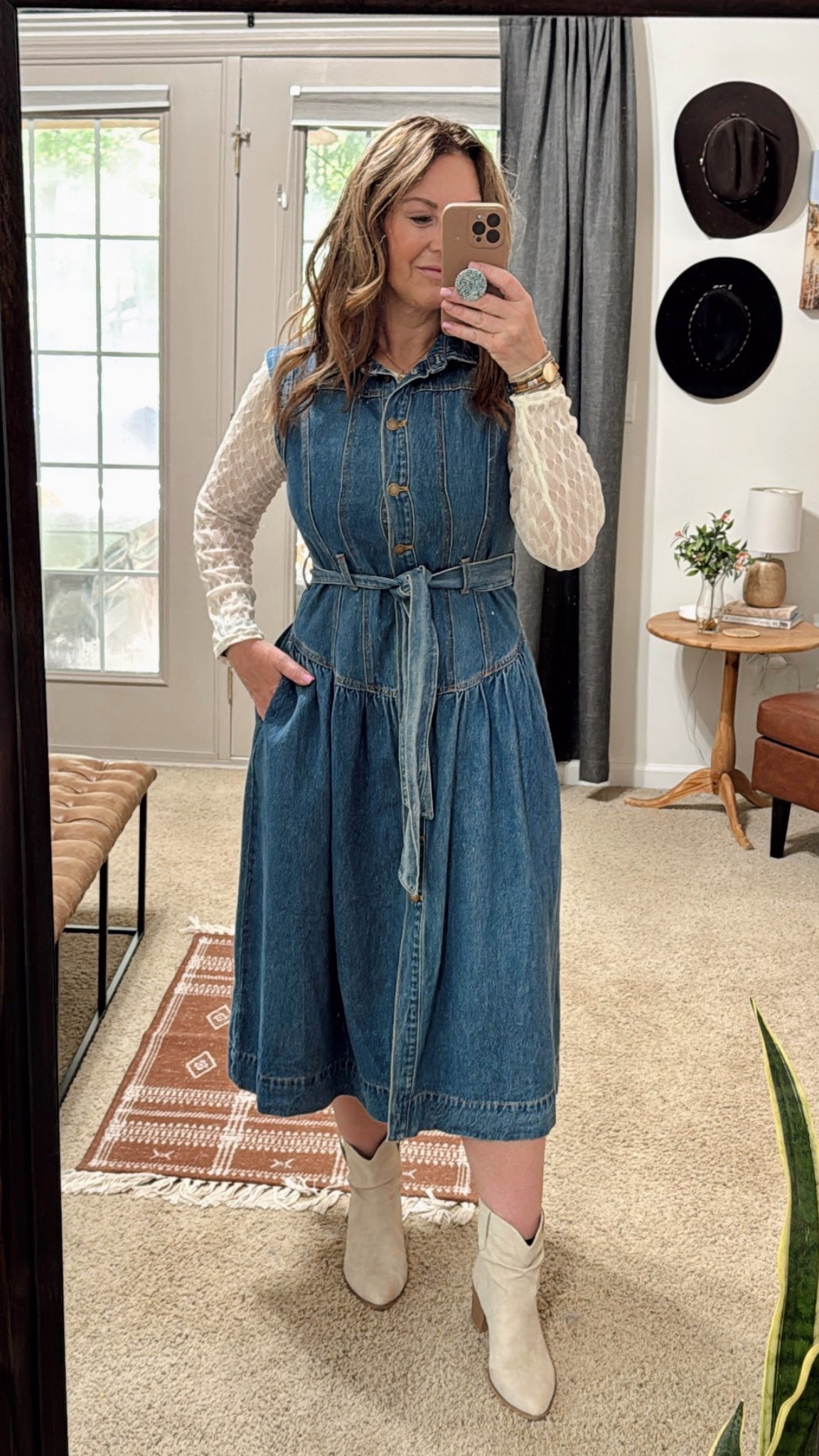Denim button up dress with tie to cinch waist. Paired with an ivory lace long sleeve top. 
Country Concert Outfit
Western style
Denim dress 

#LTKWorkwear #LTKParties #LTKMidsize