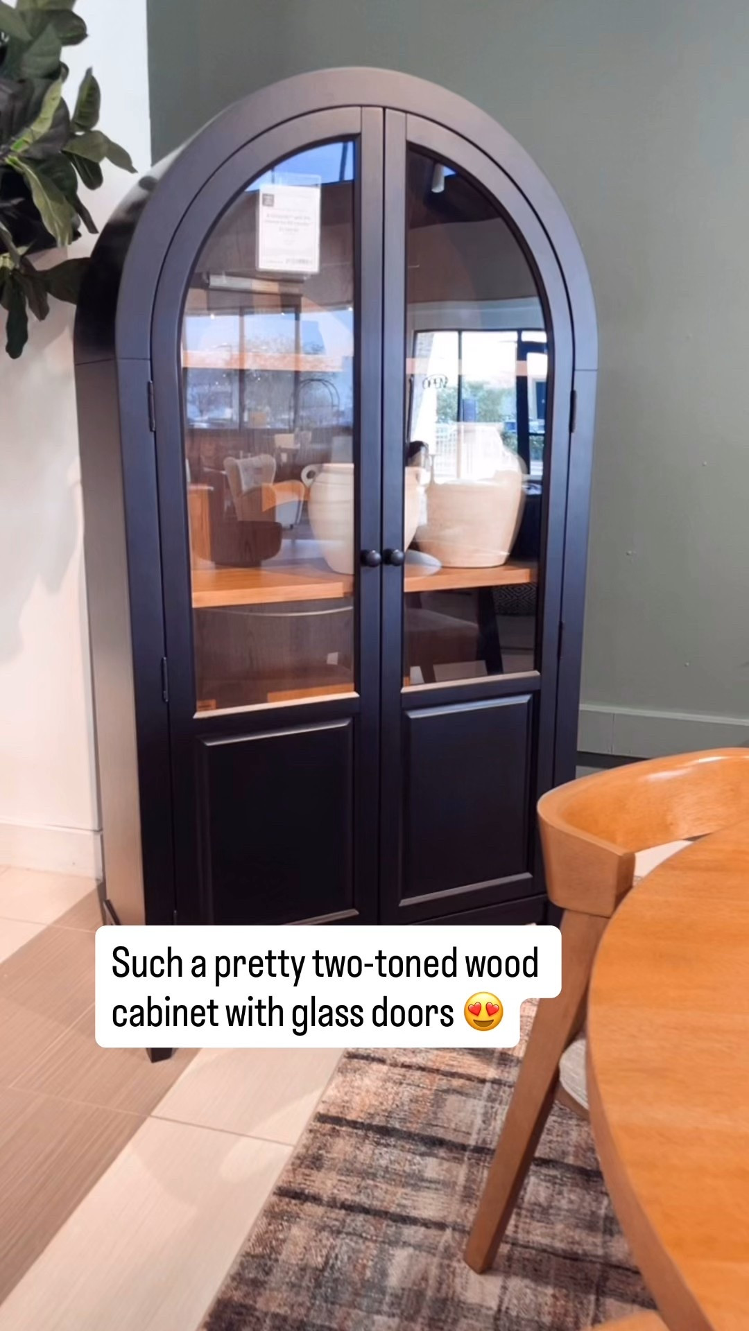 Arch top curio cabinet with glass doors. Black on the outside with natural wood tone on the inside. This one also comes in an all wood option, or white on outside/wood inside. It’s a lovely piece for a dining room! 

#LTKdayinmylife #LTKHome