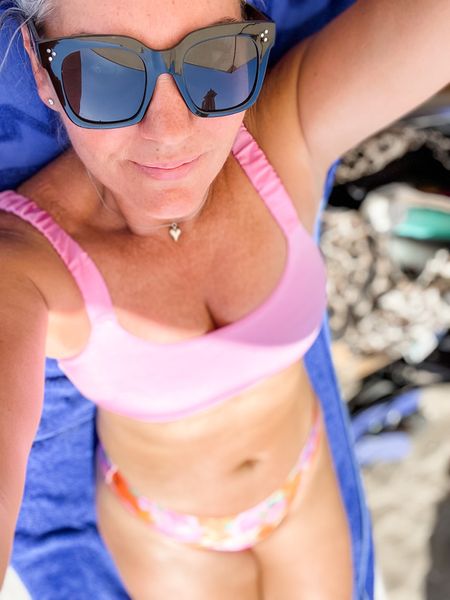 Bikini of the day. Lilac pink top (EU42) and floral bikini bottoms (EU42) which I switch out for the purple bikini bottoms (xl) after a swim  

#LTKswim #LTKtravel #LTKcurves