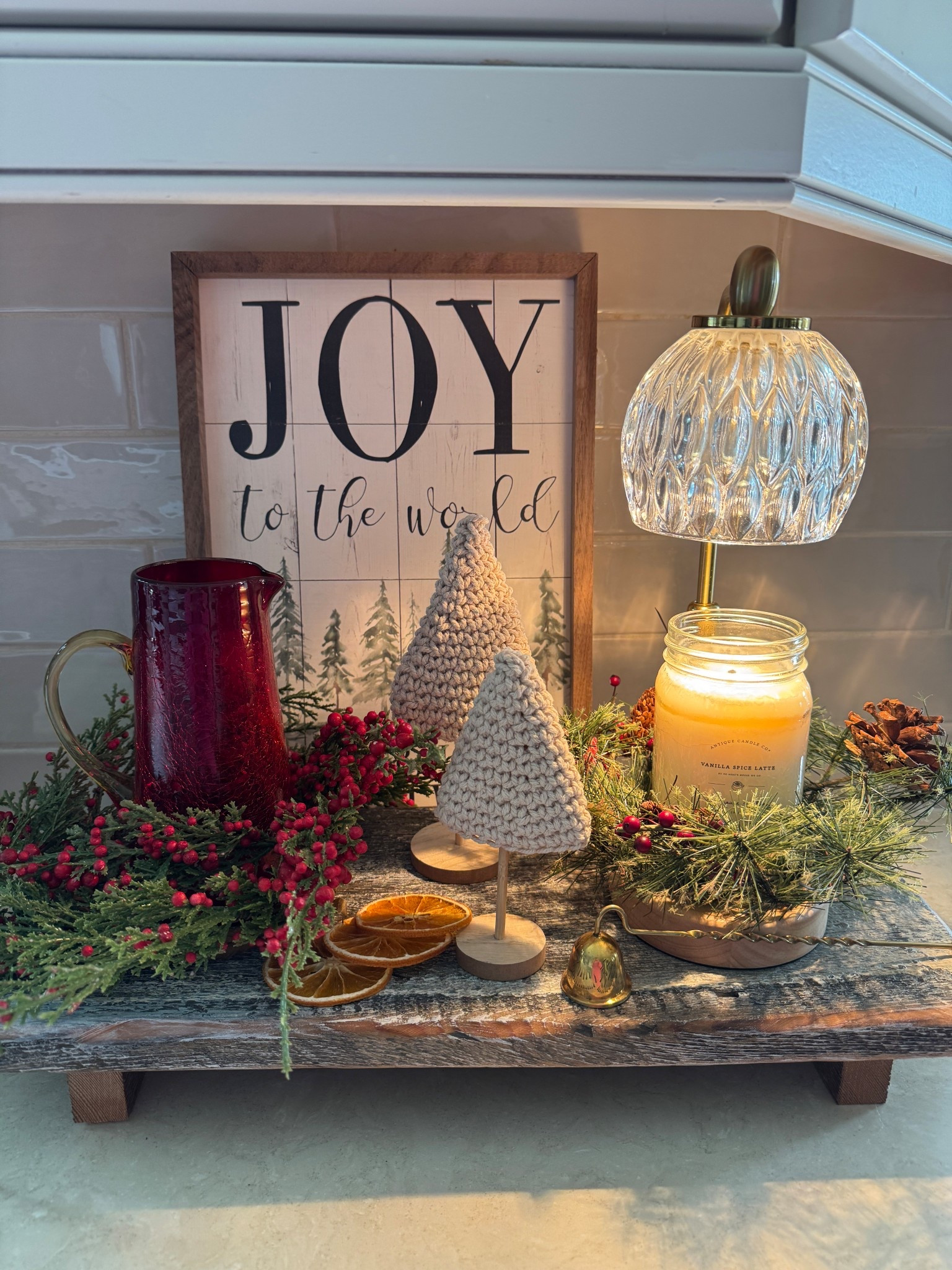Christmas tray display with candle warmer, my fave soy candles, dried oranges in a bag, vintage inspired brass candle snuffer, similar small white Christmas trees, wooden riser, Joy sign and candle rings. 

#LTKHoliday #LTKHome