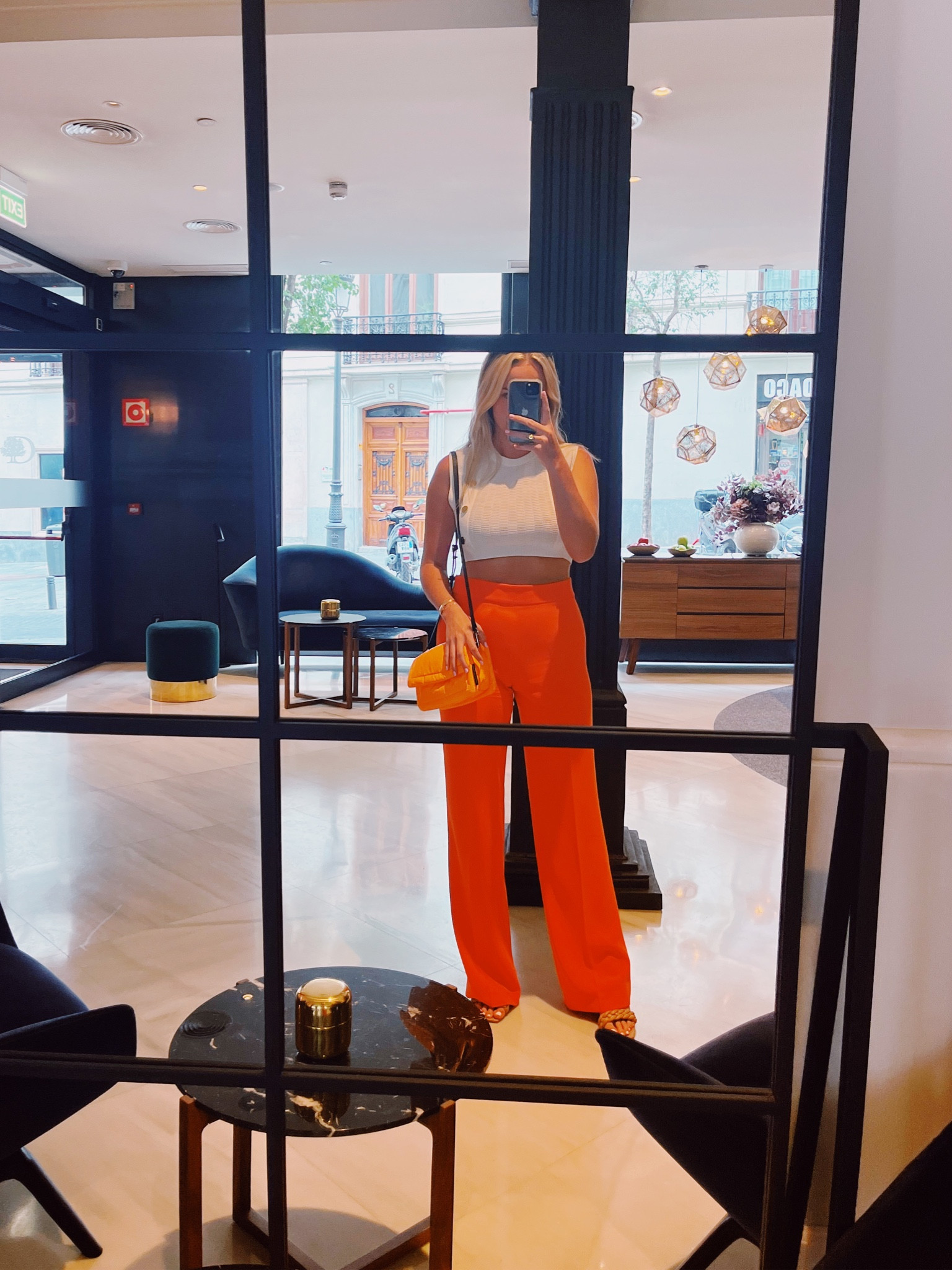 The perfect outfit for when you’re out of town and out on the town! Easy to walk in heels matched with some orange trousers and a simple white top. Marc Jacob’s bag for some extra orange, too. Top & trousers are ZARA  

#LTKstyletip #LTKitbag #LTKworkwear