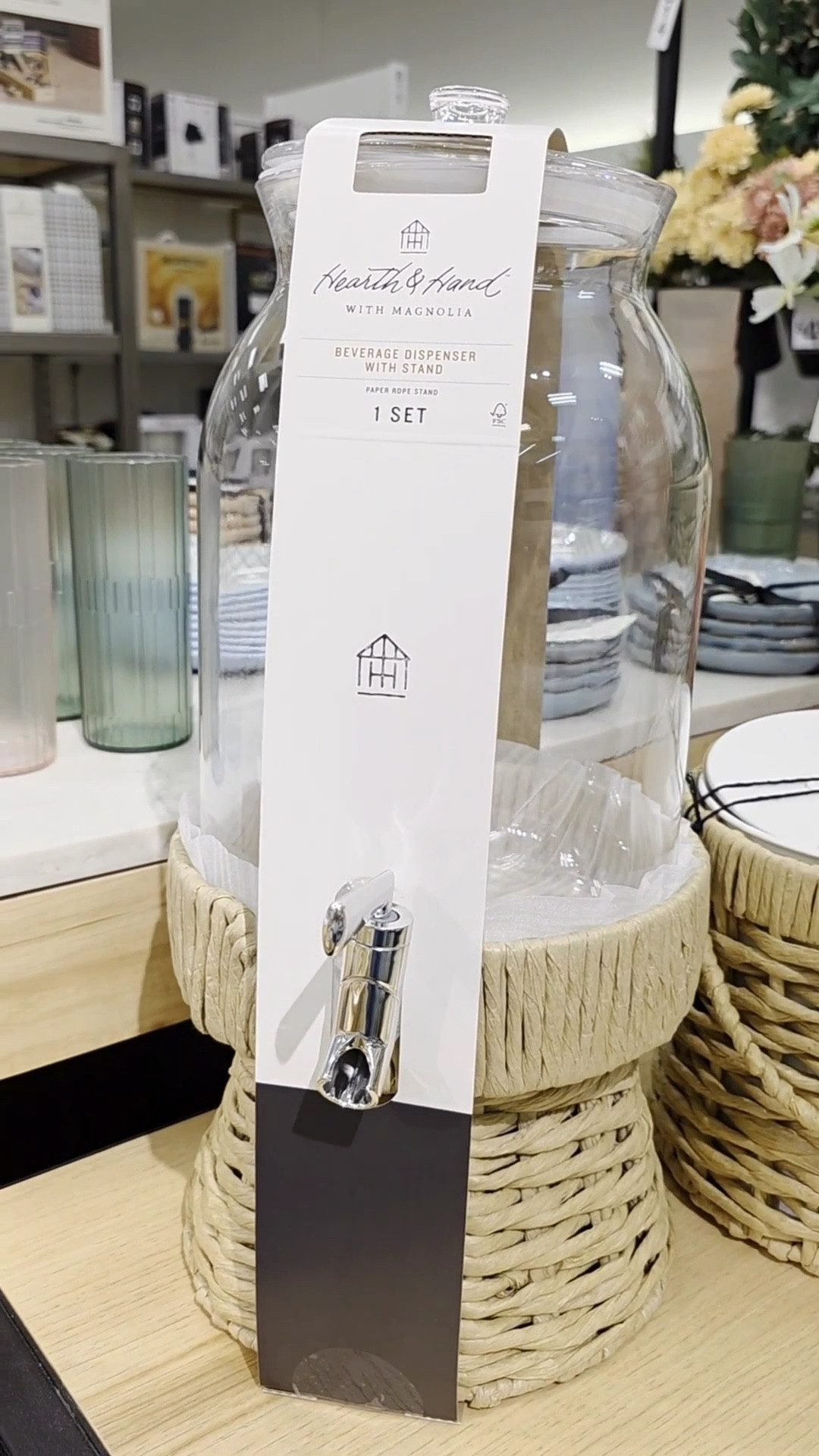 Shop this drink dispenser with woven wicker stand - With summer coming up drink dispensers are a MUST HAVE! Especially if you're the one hosting 😉 Perfect to serve your favorite drinks while also making them look beautiful 😍 No party? No problem.. fill it with water so your littles can refill their cups (they'll love it ♡) You can also get a plastic one if they're super little 🙂 Remember get a price drop notification if you heart a post/save a product 😉 

✨️ P.S. if you follow, like, share, save, or shop my post (either here or @coffee&clearance).. thank you sooo much, I appreciate you! As always thanks sooo much for being here & shopping with me 🥹 

| hearth and hand spring, hearth and hand magnolia, kitchen, kitchen essentials, storage jars, pantry jars, pantry storage, pantry organizer, pantry organization, glass food storage, food storage, food storage containers, glass food storage, glass and wood, kitchen finds, kitchen glasses, drinkware, glassware, target kitchen, target finds, target deals, cake stand, dessert stand, dessert table, target home, home finds, target hearth and hand, target kitchen, vintage kitchen, vintage decor, target must haves, target new, spring, spring dress, spring home, home decor, living room, home decor living room, target finds, target essentials, target home, from target, at target, target trip, shop with me at target |#LTKSpringSale 

#LTKxMadewell #LTKTravel #LTKGiftGuide #LTKFindsUnder50 #LTKFindsUnder100 #LTKBaby #LTKPetite #LTKPets #LTKWedding #LTKMens #LTKPlusSize #LTKWorkwear #LTKBeauty #LTKActive #LTKOver40 #LTKFamily #LTKMidsize #LTKSwim #LTKStyleTip #LTKShoeCrush #LTKHome #LTKU #LTKKids #LTKWatchNow #LTKSaleAlert #LTKSeasonal #LTKFestival #LTKBump #LTKParties #LTKItBag