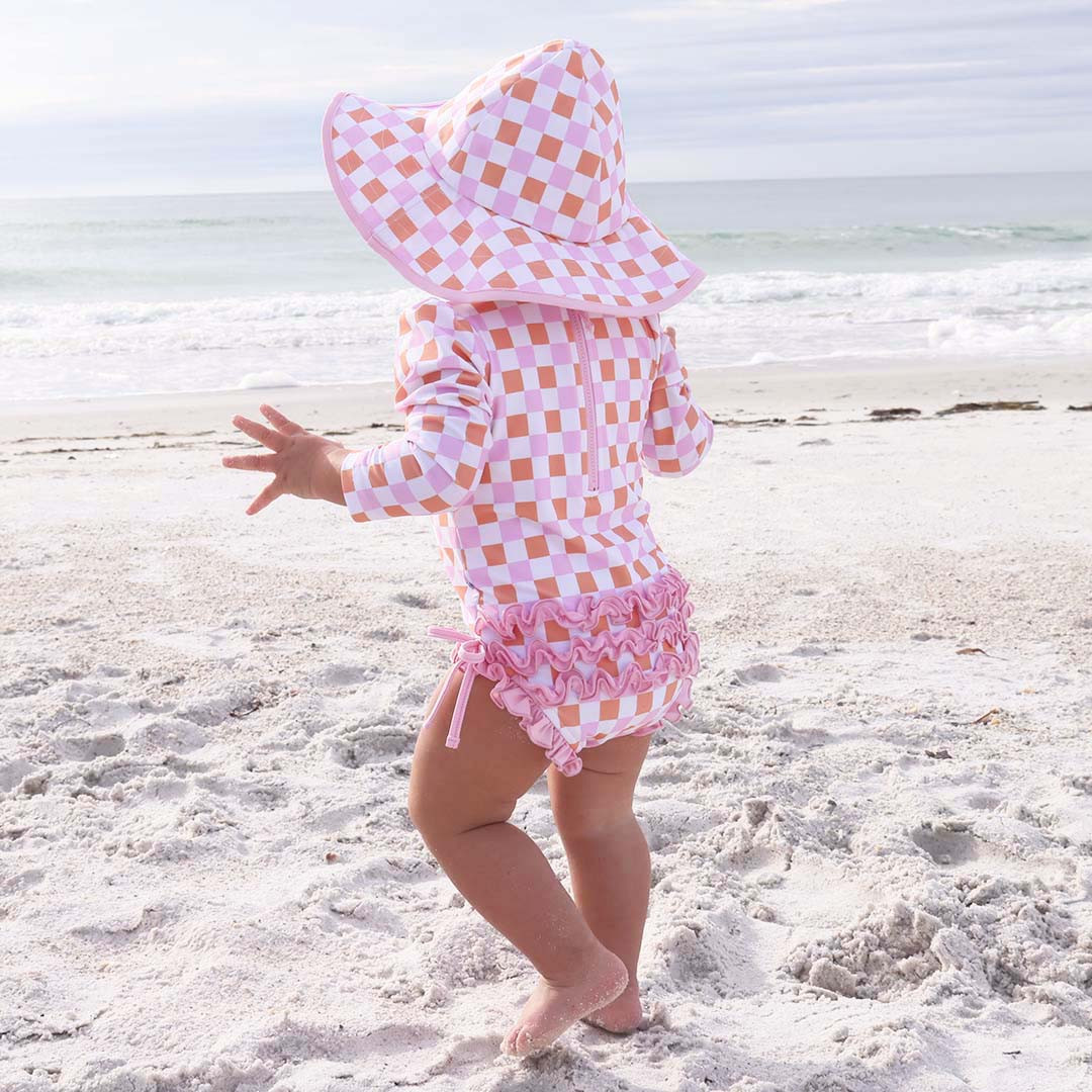 Long Sleeve Rash Guard With Ruffle Bottom | Check Me Out* | Caden Lane