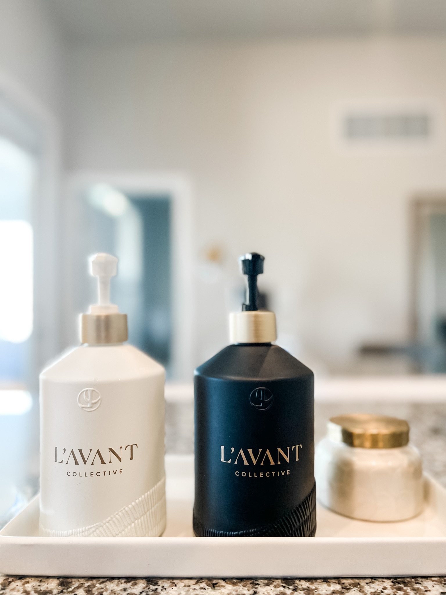 My fav hand soap and dish soap bottles with white tray, plus the yummiest volcano candle. The perfect color combo: white + black + gold 🤎#LTKCyberweek 

#LTKGiftGuide #LTKsalealert