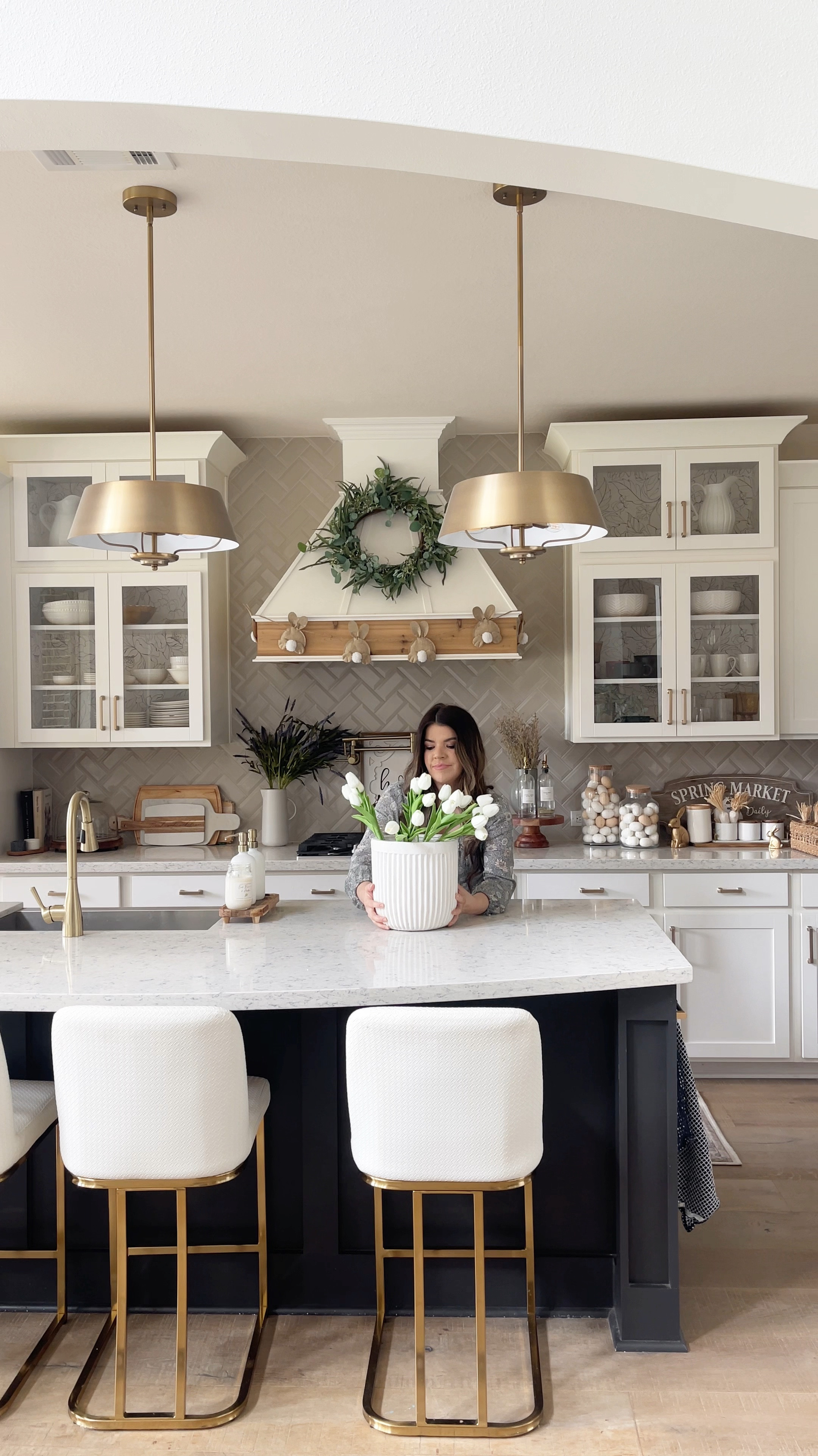 Kitchen, kitchen finds, white kitchen, white stools, white bar stools, wood bar stools, white vase, fluted vase, fluted planter, tulips, spring flowers, faux florals, gold pendants, champagne bronze pendants, venthood, custom venthood, wood accents, wood decor, glass cabinets 

#LTKFind 

#LTKstyletip #LTKhome